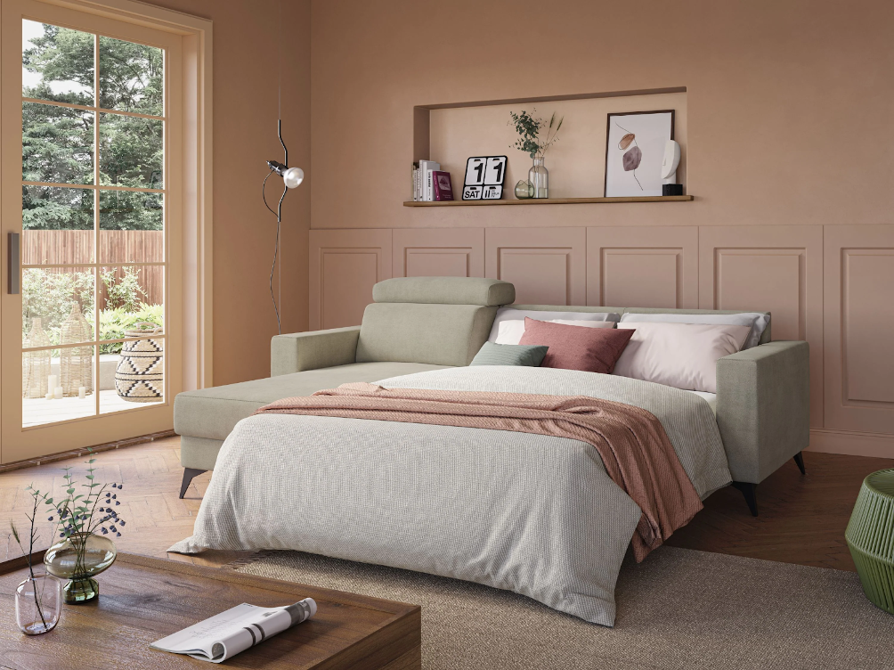 Divano letto con penisola, comfort e praticità