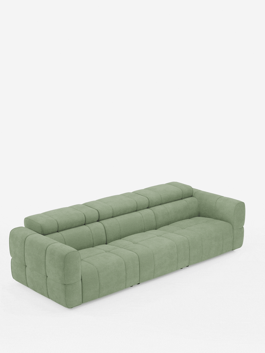 Il divano modulare Giotto a 4 posti con poggiatesta reclinabili e funzione relax elettrica opzionale, rivestito in tessuto smacchiabile T23, è un divano modulare a quattro posti di colore verde salvia, caratterizzato da un design trapuntato e dal profilo ribassato, con braccioli squadrati e spessi e cuscini dello schienale.