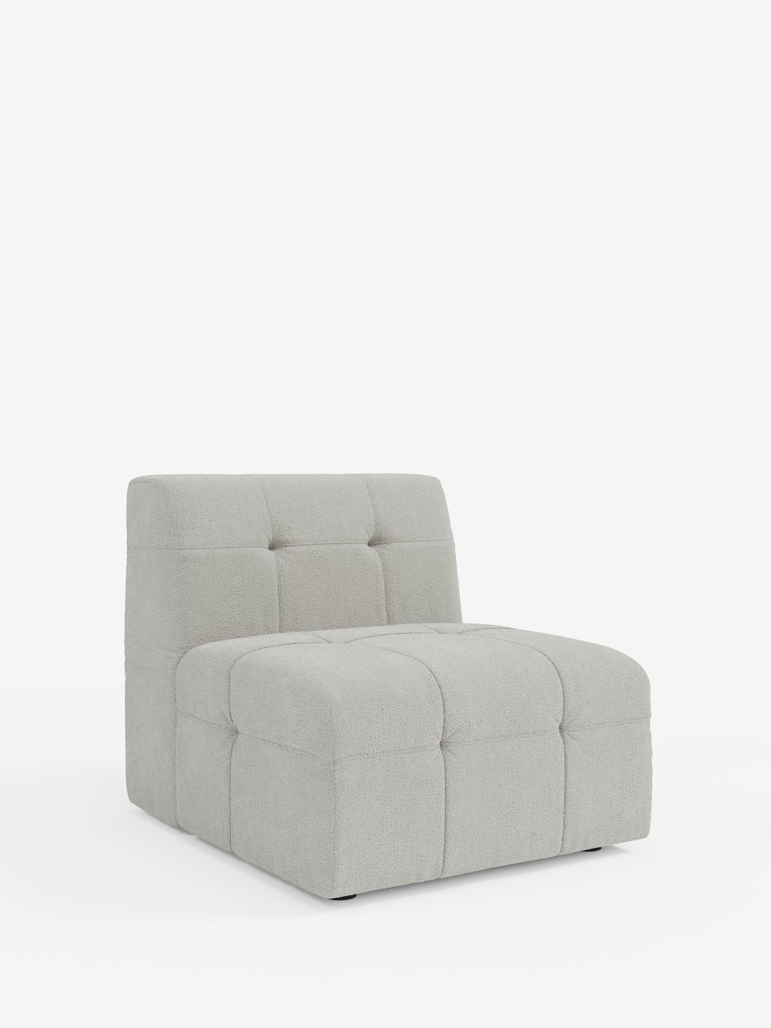 Vi presentiamo la Mosaic Modulo Poltrona 77 cm di Divani.Store: una poltrona moderna senza braccioli che si ispira al design classico della poltrona. Rivestita in tessuto bouclé T21 resistente alle macchie, questa poltrona presenta una silhouette squadrata e dal profilo ribassato, con cuscini profondi per la seduta e lo schienale impreziositi da una delicata trapuntatura capitonné. Progettata senza gambe a vista, poggia direttamente sul pavimento per un look contemporaneo.