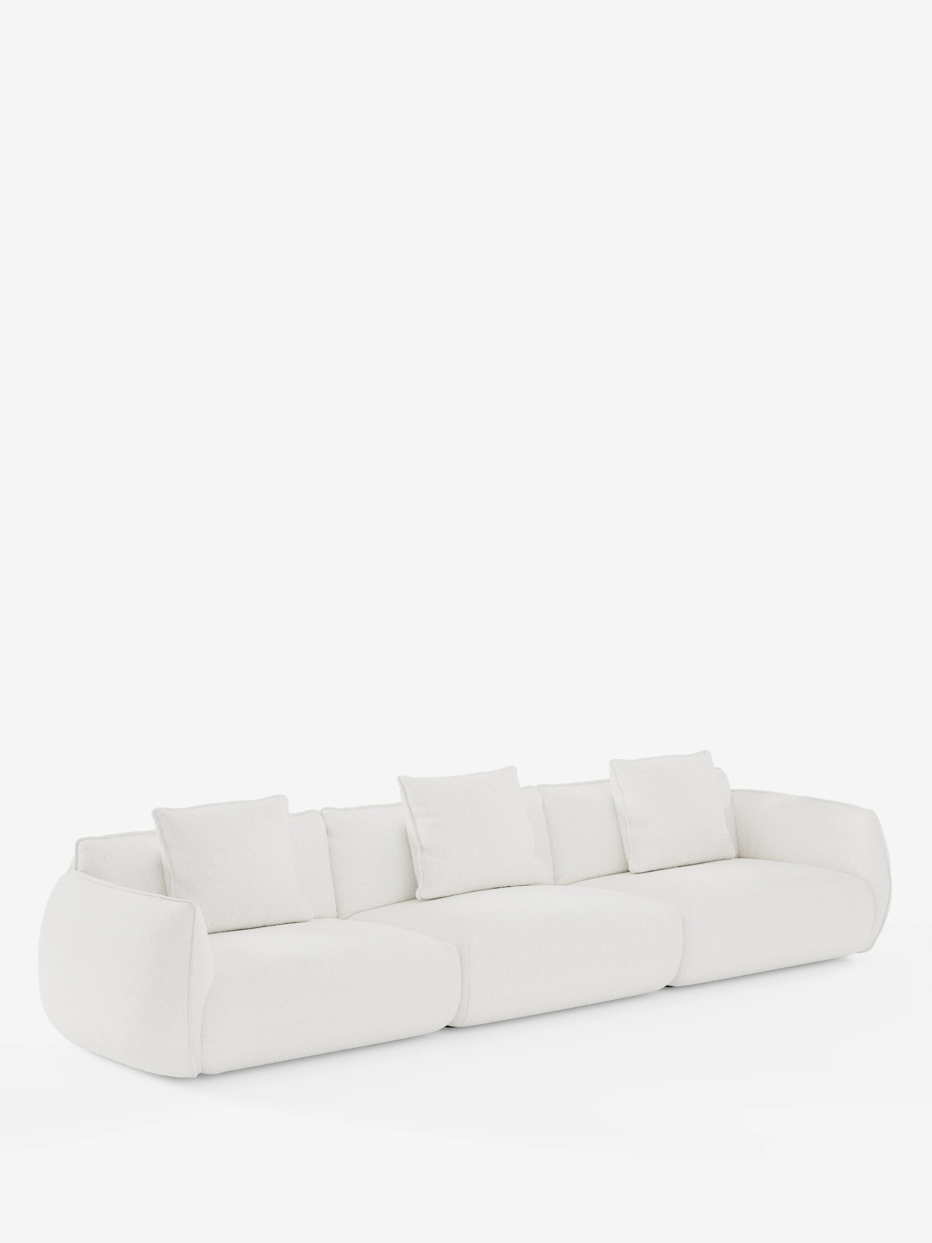 Un divano modulare Nimbus moderno e minimalista a 3 posti, realizzato da Divani.Store con il tessuto T33, morbido ed antimacchia dall’effetto cotone. Questo divano modulare bianco è composto da tre moduli di seduta dai bordi arrotondati e include quattro cuscini quadrati coordinati. Si stacca su uno sfondo bianco a tinta unita, creando un’estetica pulita e contemporanea.