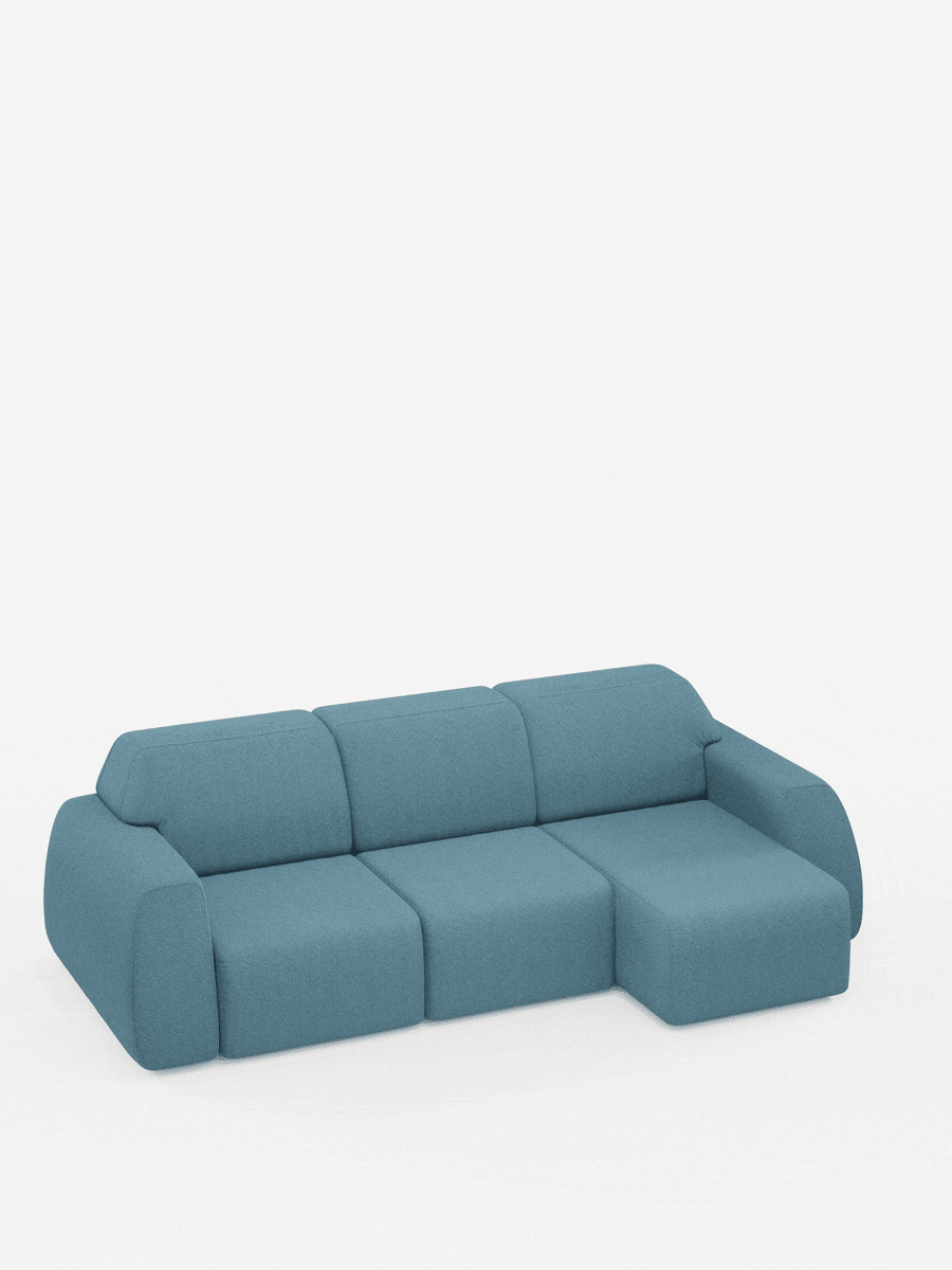 Il divano angolare Orbit con penisola reversibile e tutte le sedute allungabili in tessuto smacchiabile effetto cotone T33 di Divani.Store è un divano componibile contemporaneo caratterizzato da braccioli curvi e linee morbide. Rivestito in tessuto color verde acqua, resistente alle macchie ed effetto cotone, questo divano minimalista include una chaise longue reversibile posizionata sulla destra e si presenta su uno sfondo bianco senza giunture, senza gambe a vista.