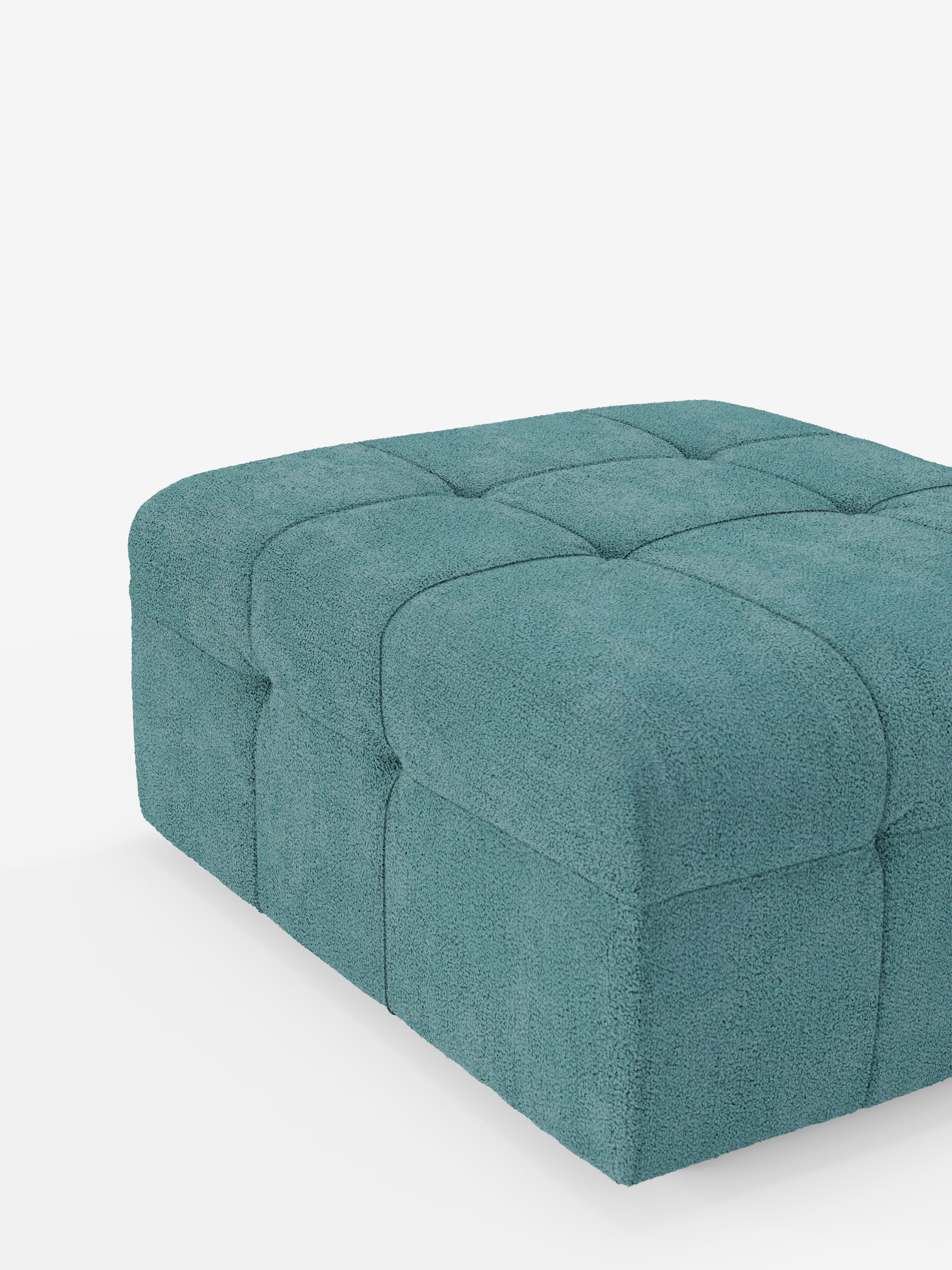 Ecco la frase riscritta utilizzando i dati del prodotto forniti: Il pouf e modulo Mosaic in bouclé di Divani.Store è un morbido pouf quadrato che misura 96x77 cm, caratterizzato da un design capitonné e rivestito in tessuto T21 color verde acqua resistente alle macchie. Realizzato in Italia, questo invitante pouf si presenta su uno sfondo bianco e presenta sezioni imbottite e trapuntate per un comfort ancora maggiore.