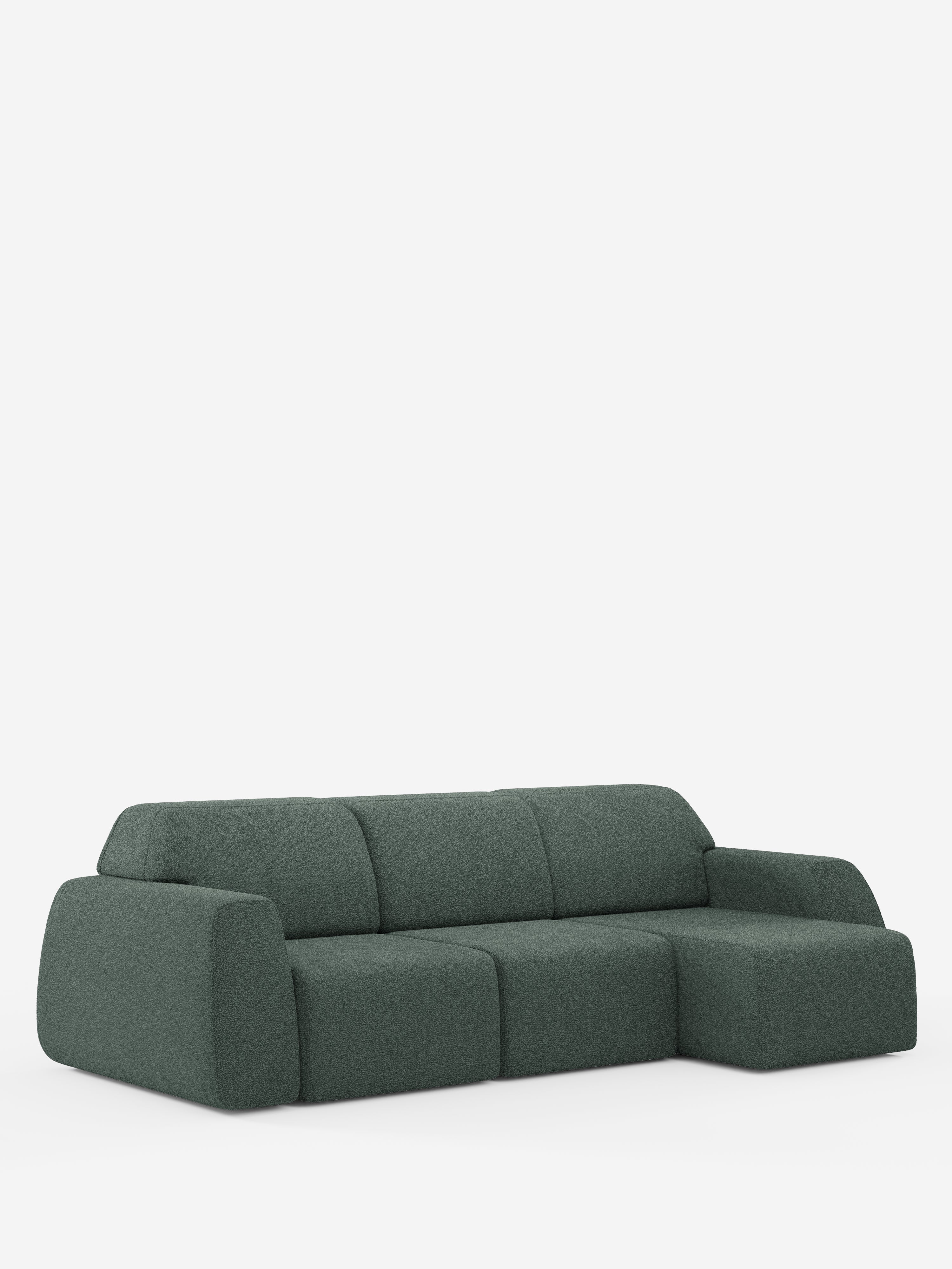 Un divano componibile contemporaneo di colore verde scuro — Orbit Divano angolare con penisola reversibile e tutte le sedute allungabili in tessuto smacchiabile effetto cotone T33 di Divani.Store — presenta ampi braccioli, morbidi cuscini e una versatile chaise longue reversibile. Questo modello di alta gamma vanta una silhouette minimalista con bordi morbidi e arrotondati e un rivestimento in tessuto antimacchia effetto cotone. Presentato su uno sfondo bianco a tinta unita.