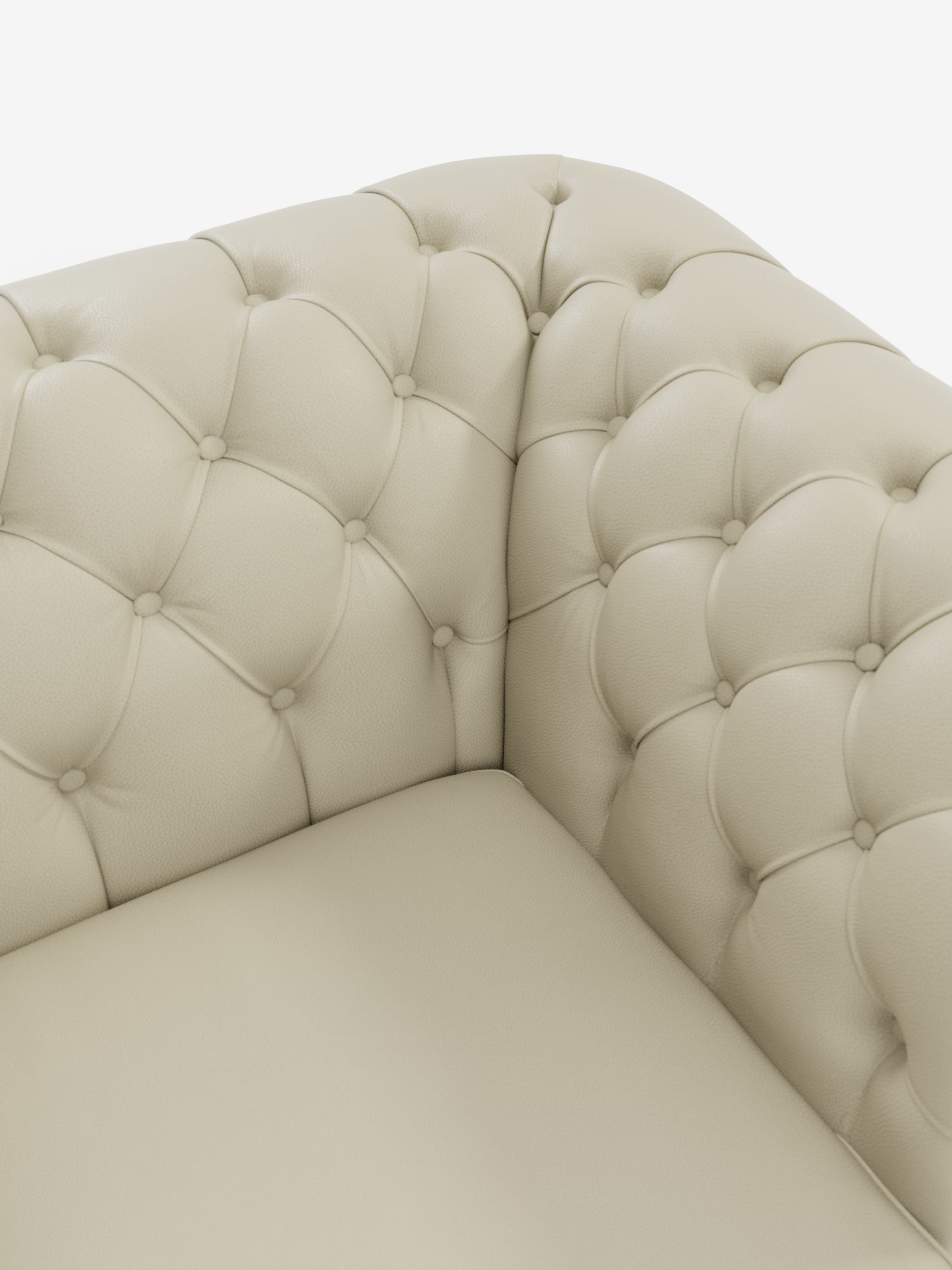 Primo piano dell'angolo di una poltrona Chester 4 Posti 3 sedute in Vera Pelle – Chesterfield Capitonné Artigianale di Divani.Store, caratterizzata da un morbido rivestimento artigianale con profondi dettagli a bottoni che creano un motivo a rombi. La vera pelle, liscia e leggermente lucida, mette in risalto la maestria artigianale sullo sfondo bianco.