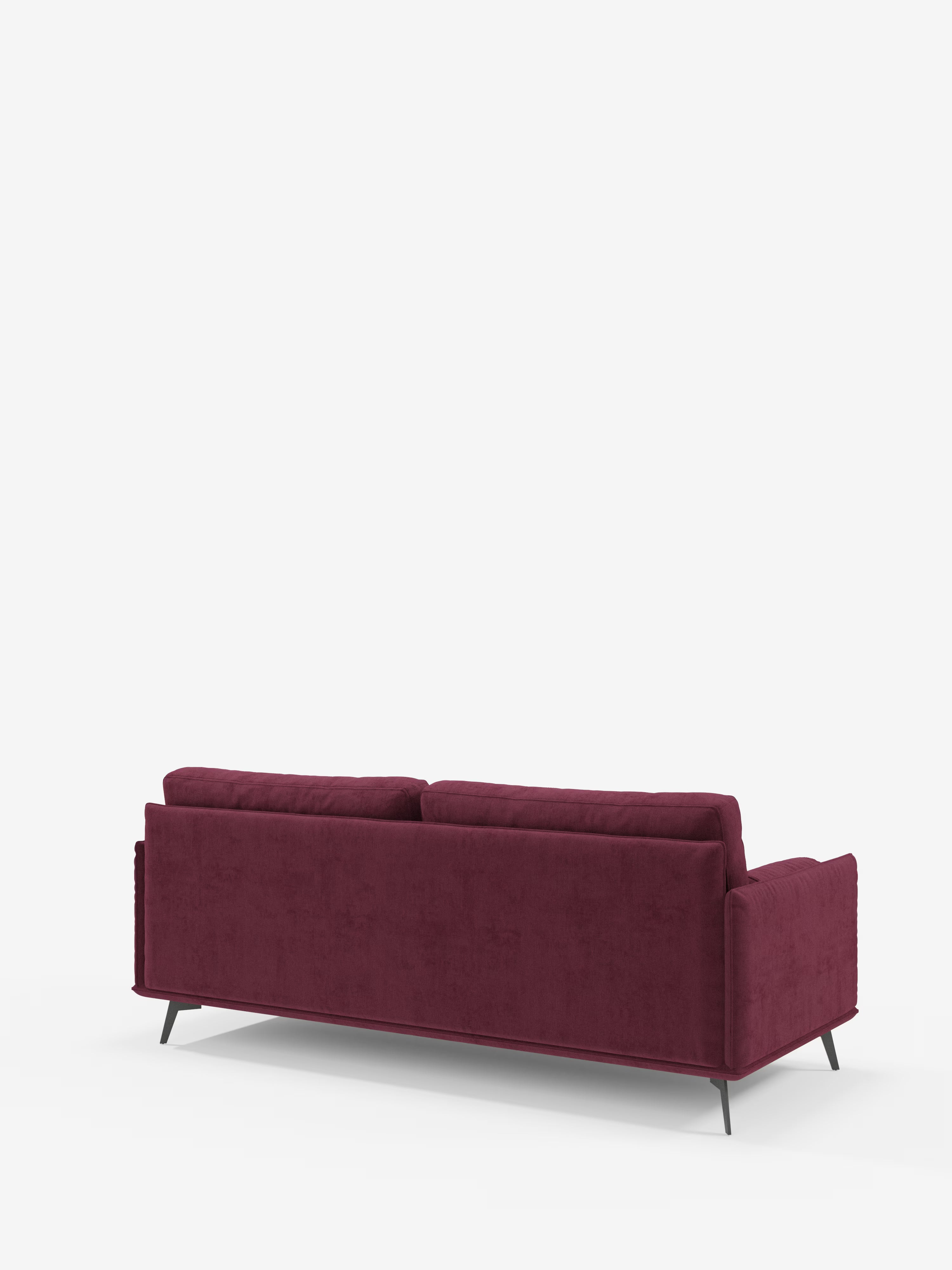 Il divano lineare Basalto a 2 o 3 posti con seduta unica e base in metallo, rivestito in tessuto smacchiabile T31 di Divani.Store, è raffigurato di retro su uno sfondo bianco a tinta unita. Questo divano moderno si caratterizza per le linee pulite, i morbidi cuscini dello schienale e le sottili gambe in metallo nero inclinate verso l’esterno, che gli conferiscono un aspetto elegante e contemporaneo.