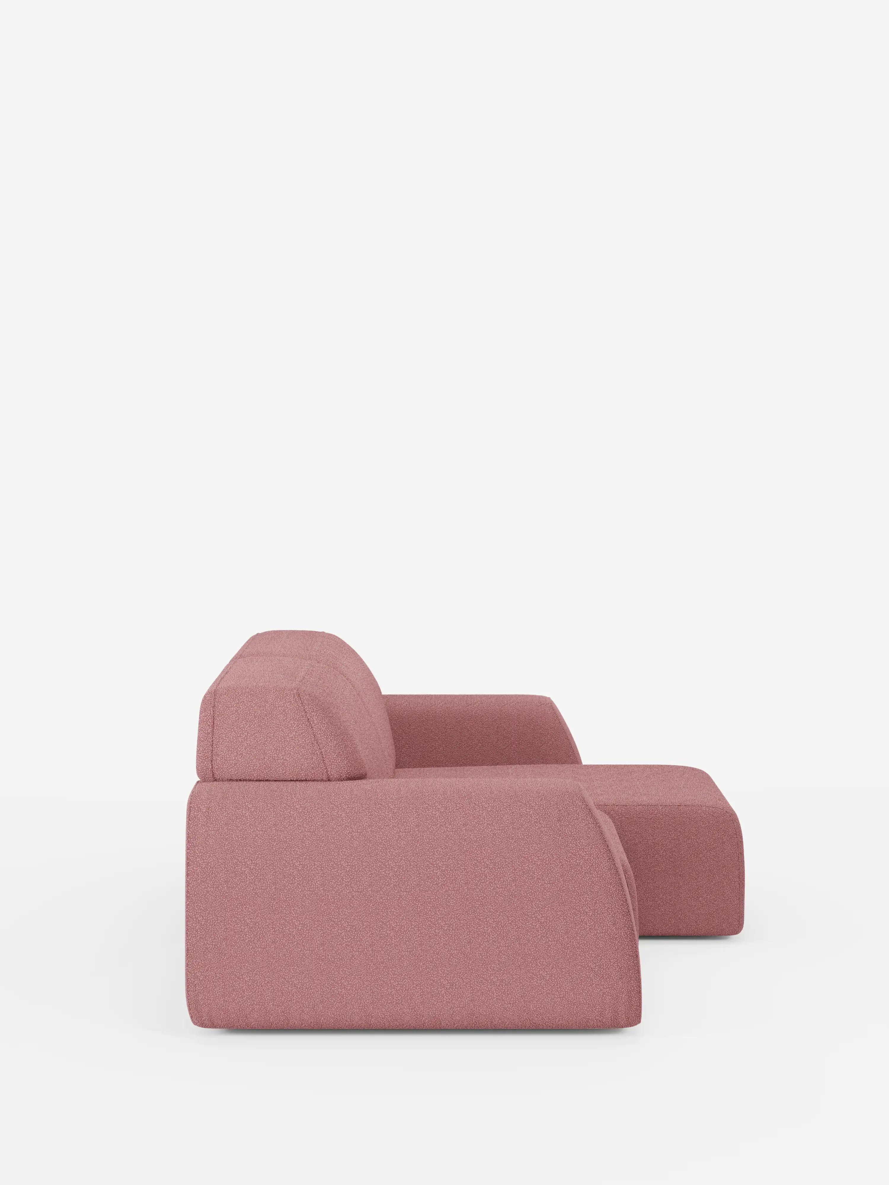 Un divano Orbit rosa, contemporaneo e minimalista, a 2 e 3 posti con sedute scorrevoli di Divani.Store è raffigurato di profilo su uno sfondo bianco a tinta unita. Lo schienale basso e gli ampi braccioli si abbinano perfettamente al rivestimento morbido e testurizzato in tessuto smacchiabile effetto cotone T33, mentre la seduta spaziosa e dalle linee geometriche e i rivestimenti in tessuto completamente sfoderabili incarnano il vero design moderno.