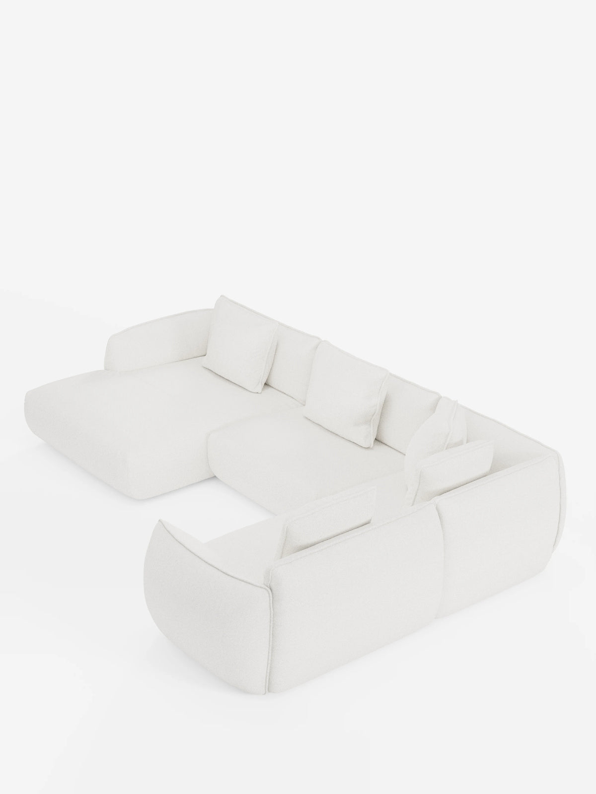 Il divano angolare panoramico componibile Nimbus con penisola e angolo in tessuto smacchiabile T33 di Divani.Store è un moderno divano componibile a L di colore bianco sporco, caratterizzato da braccioli e schienali bassi e arrotondati. Comprende tre cuscini di seduta e quattro cuscini schienali rettangolari, e poggia direttamente sul pavimento senza gambe a vista, per un look minimalista e accogliente.