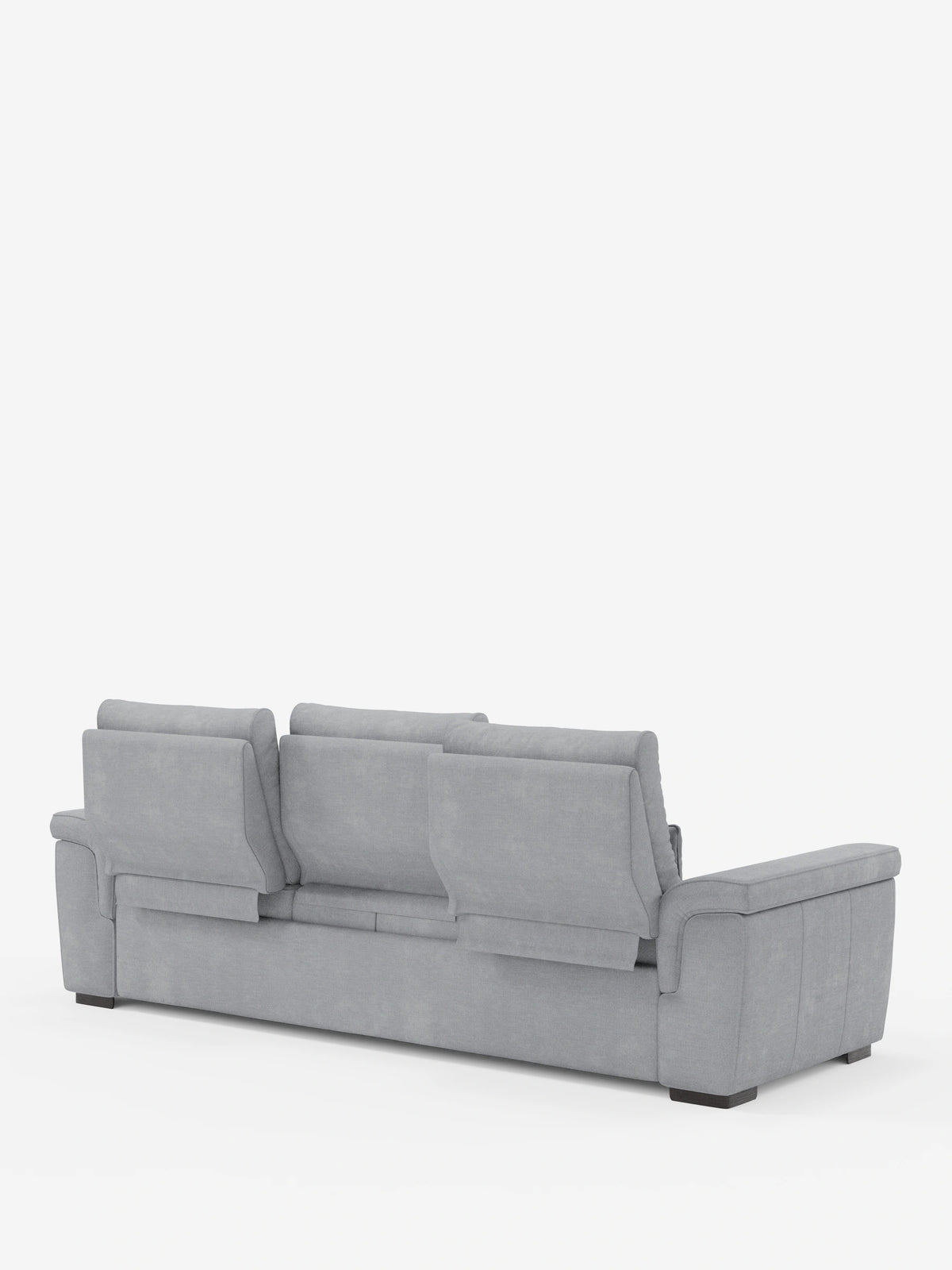 Un divano letto angolare Ischia di colore grigio chiaro, con schienali scorrevoli, visto da dietro, caratterizzato da tre schienali imbottiti regolabili, un ampio bracciolo destro e piccoli piedini scuri su uno sfondo bianco.