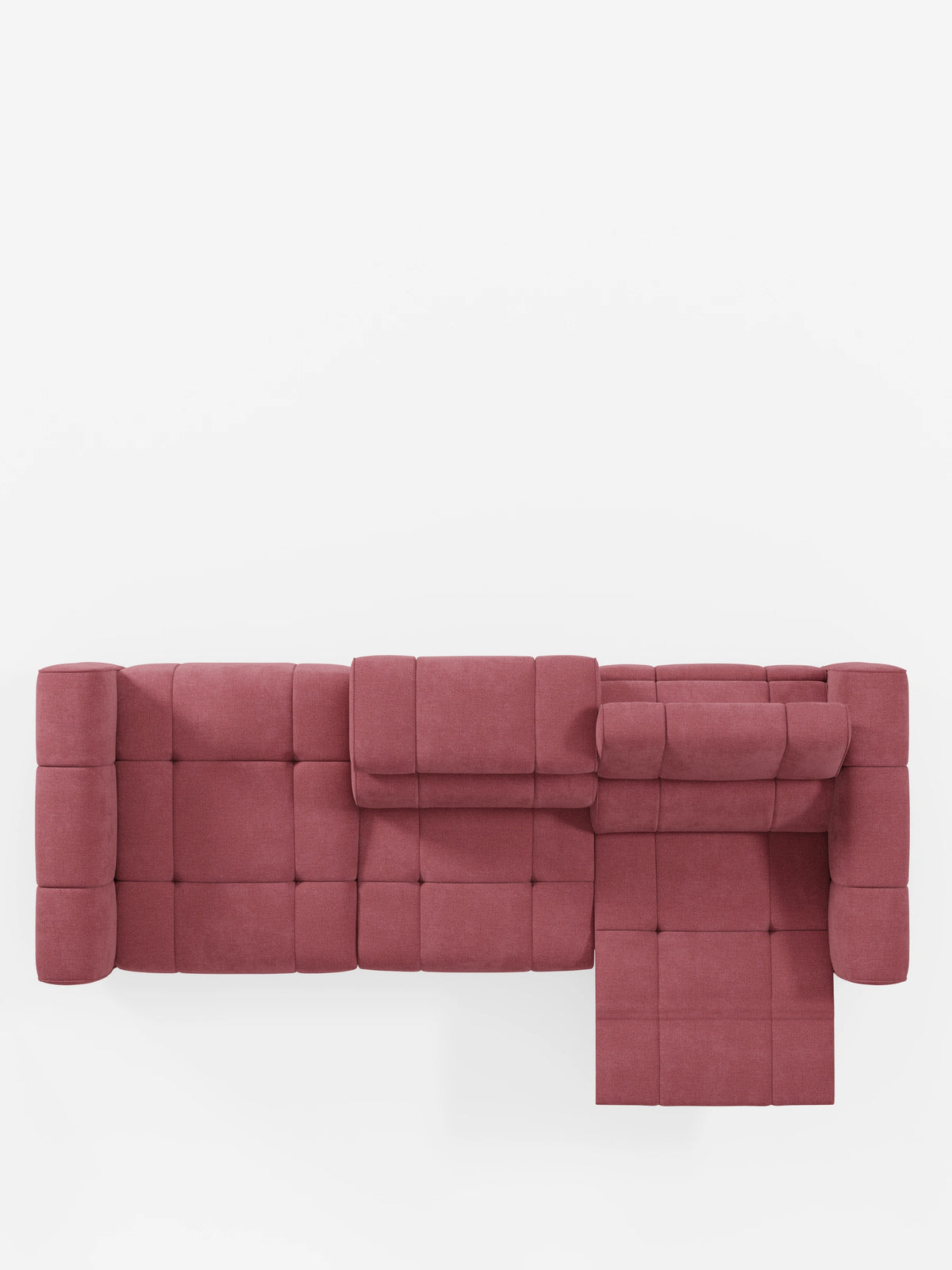 Una vista dall'alto del divano componibile Giotto con terminale aperto - opzione relax elettrico in tessuto smacchiabile T23 color rosa polveroso, caratterizzato da un design trapuntato, chaise longue e poggiatesta regolabili.