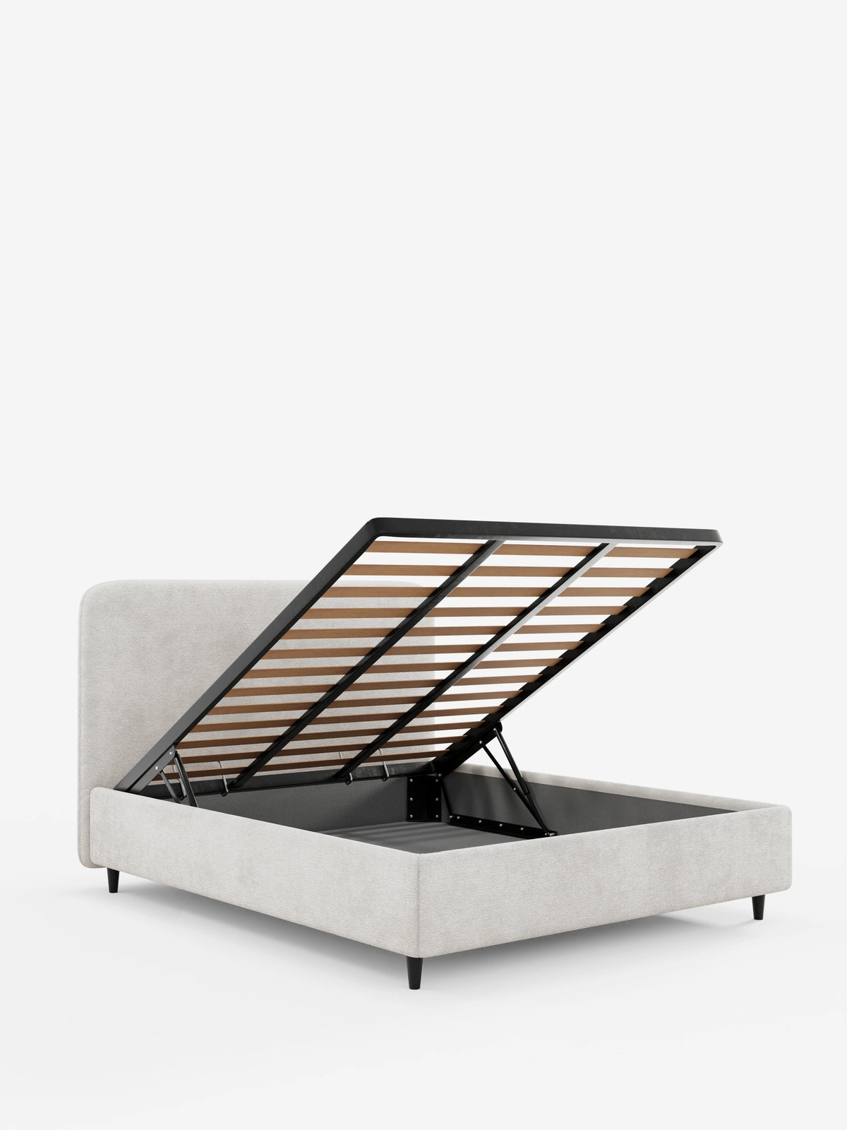 KAELOS, letto imbottito in stile minimalista realizzato in tessuto ciniglia grigio chiaro, con testiera arrotondata e gambe alte e sottili; la base a doghe rialzata rivela un ampio vano contenitore su uno sfondo bianco uniforme.