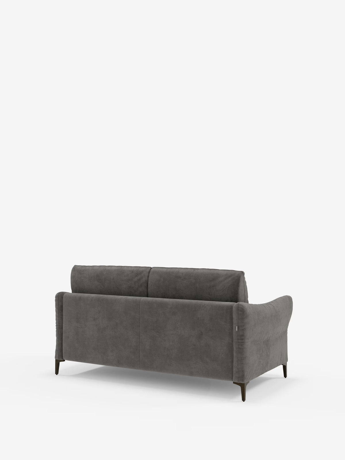 Il divano letto Dalia a 2, 3 e 4 posti di Divani.Store è raffigurato nella vista posteriore, rivestito in un elegante tessuto vellutato grigio smacchiabile T30. È caratterizzato da due ampi cuscini dello schienale, braccioli leggermente ricurvi e gambe corte in legno scuro. Sullo sfondo bianco a tinta unita, il design moderno e minimalista risalta particolarmente, offrendo un comodo materasso alto 18 cm per un sonno riposante una volta trasformato in letto.
