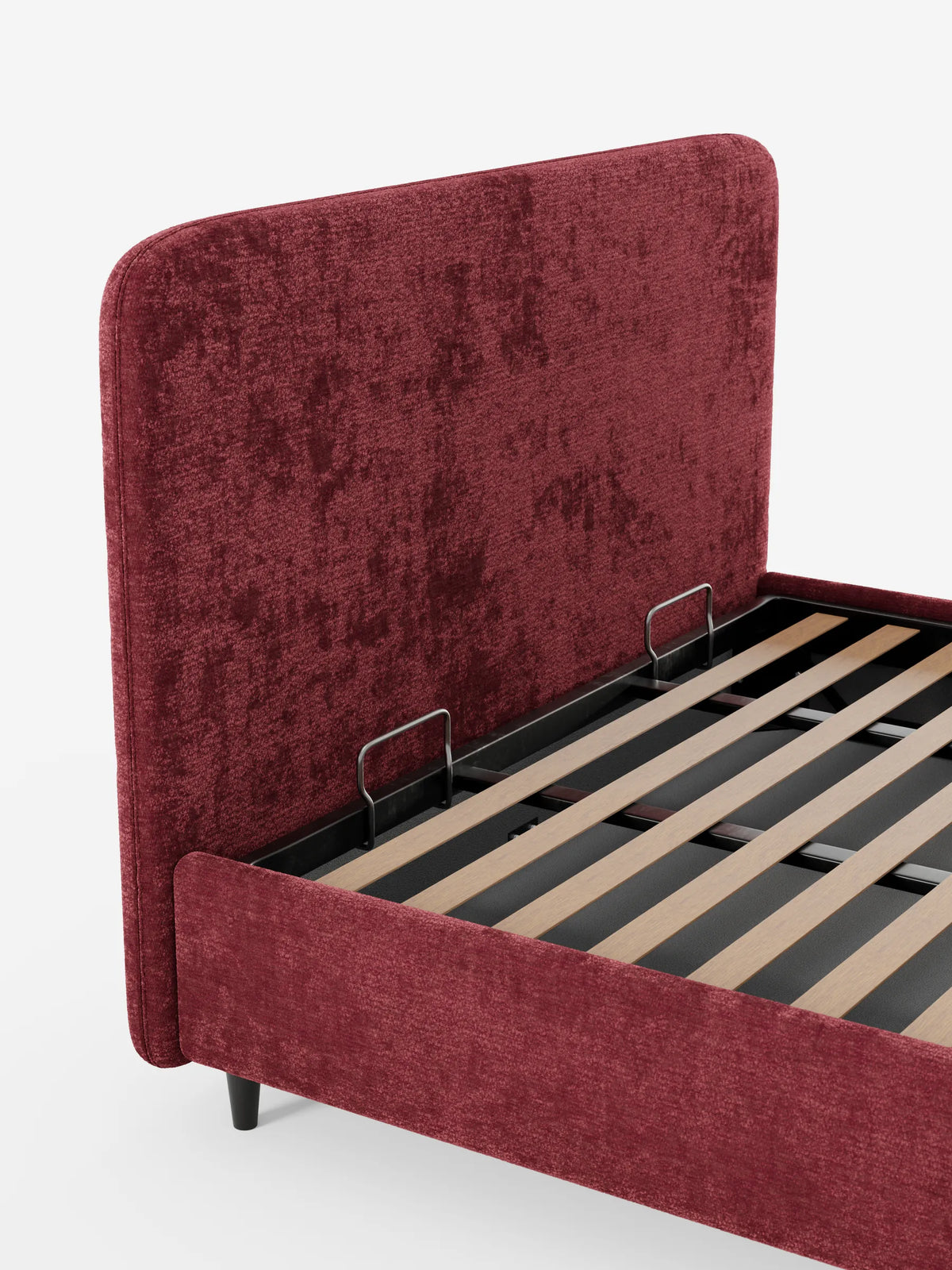 KAELOS, letto imbottito in stile minimalista - vano contenitore, gambe alte e testiera arrotondata in tessuto ciniglia, caratterizzato da una testiera arrotondata in tessuto testurizzato rosso intenso, gambe sottili e scure e una rete a doghe con vano contenitore.