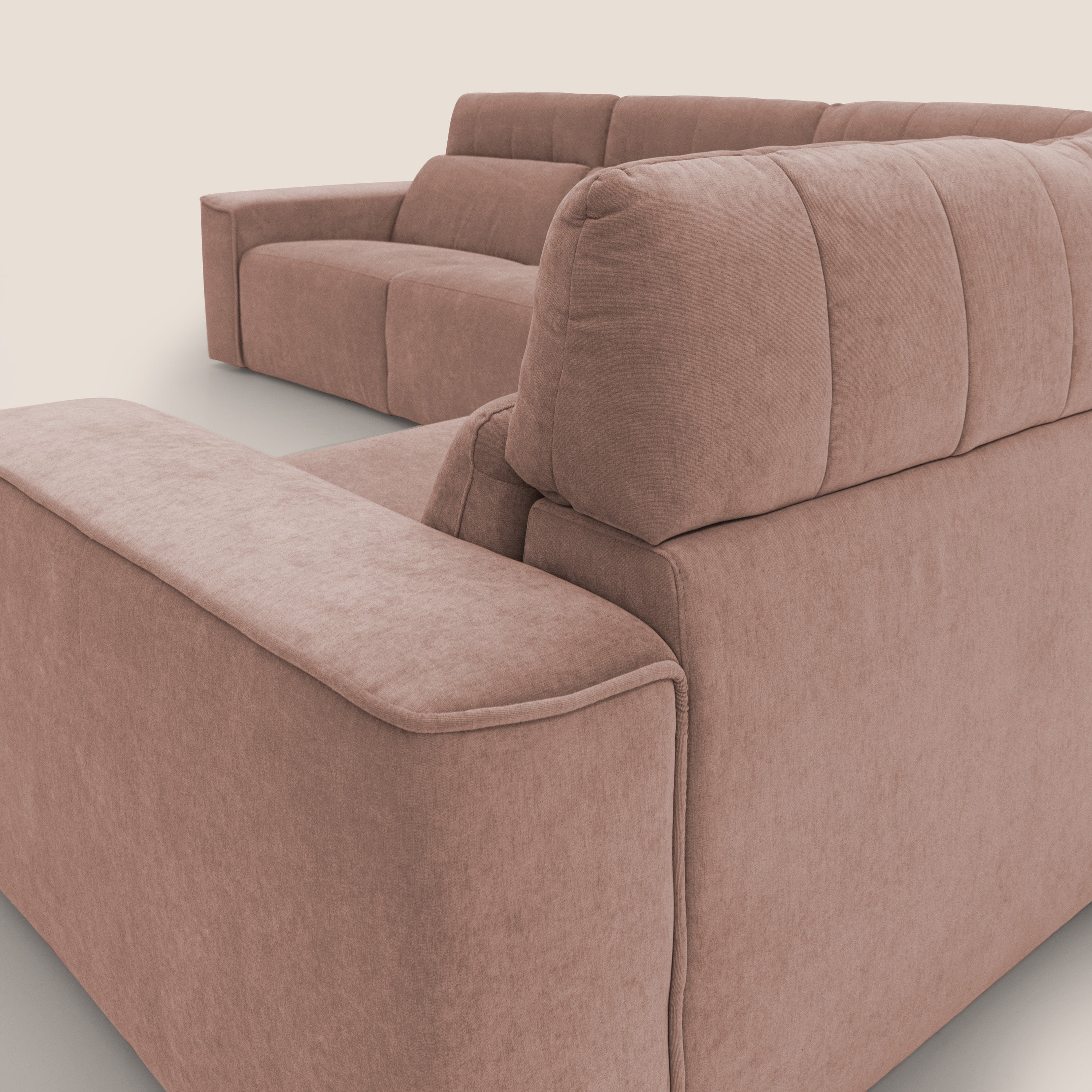 Clark Divano modulare angolare REVERSIBILE con opzione relax elettrico in tessuto smacchiabile impermeabile T17 rosa - divani.store