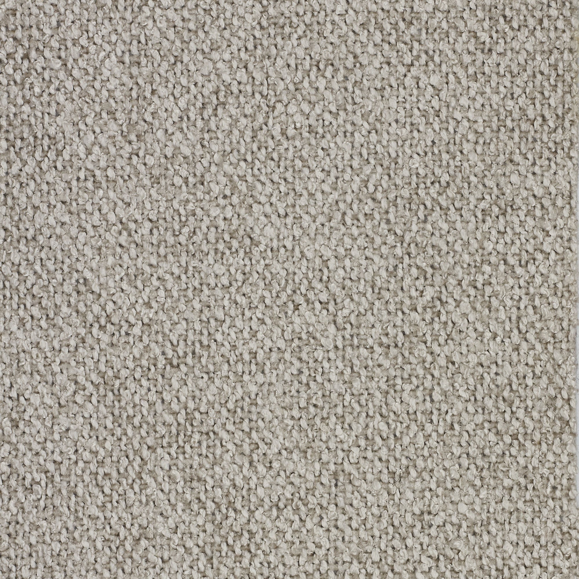 Vista ravvicinata di Personalizzazione in T33 di Divani.Store, che mostra un tappeto beige strutturato con fibre a trama fitta e piccole asole arrotondate per una superficie morbida, densa e resistente.