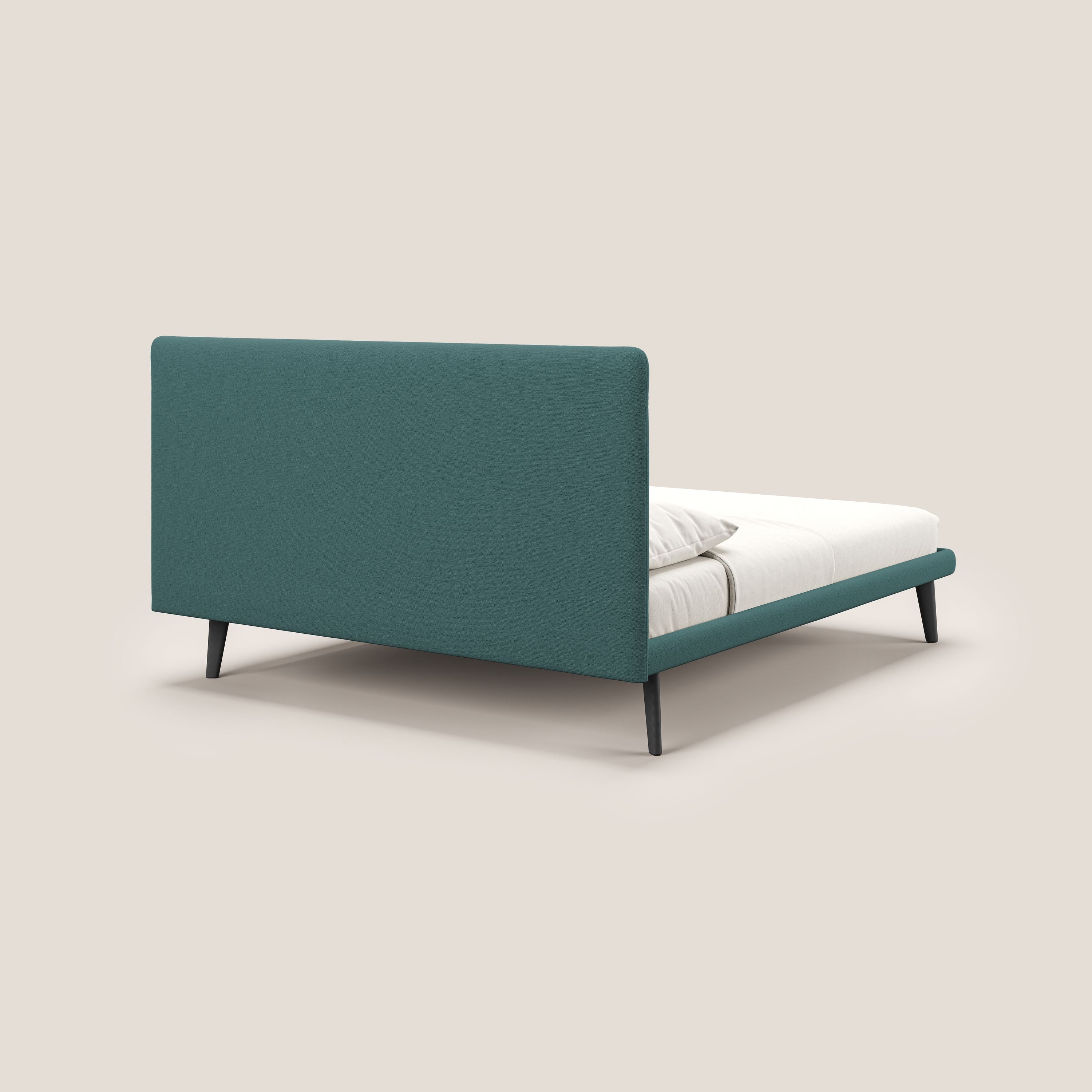 Noel letto minimal scandinavo con piedi in mogano e tessuto fiammato impermeabile T19 petrolio - divani.store