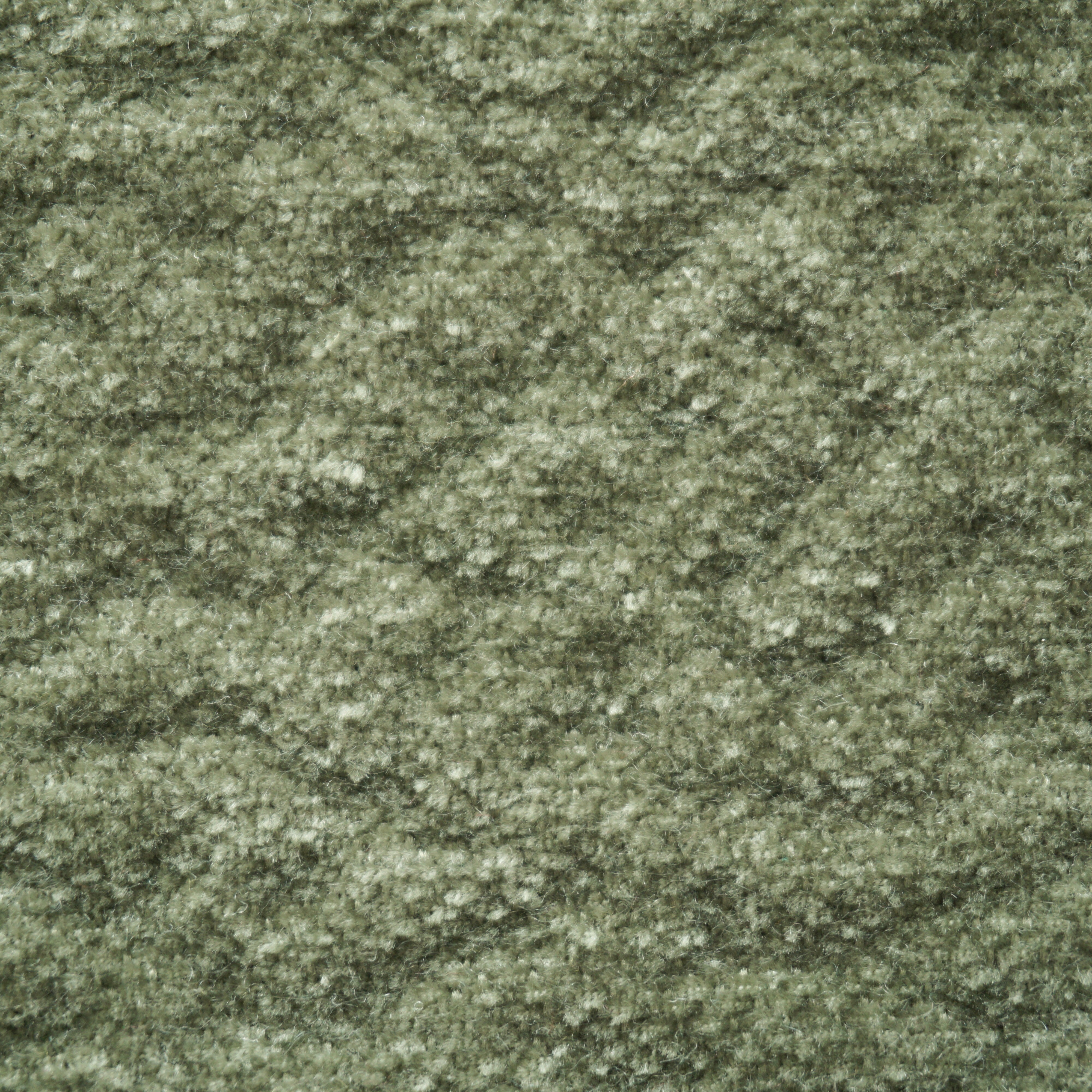 Primo piano della "Personalizzazione in T27" di Divani.Store: un tessuto verde dalla superficie morbida e felpata, con motivi ondulati e irregolari in tonalità di verde screziate per un aspetto naturale simile al muschio. Non sono visibili forme o oggetti distinti.