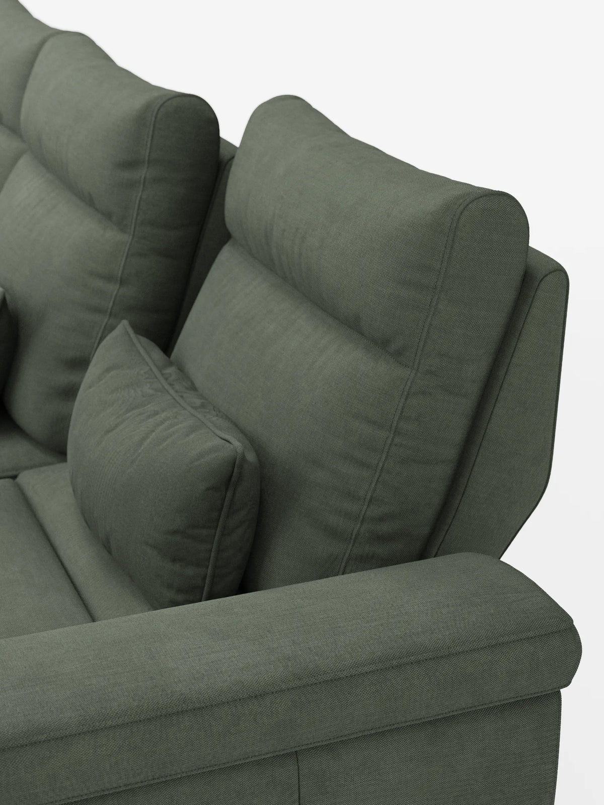 Un divano letto angolare Ischia color verde salvia, con schienali scorrevoli, cuscino decorativo abbinato, trama intrecciata e schienali regolabili, su uno sfondo semplice e chiaro.