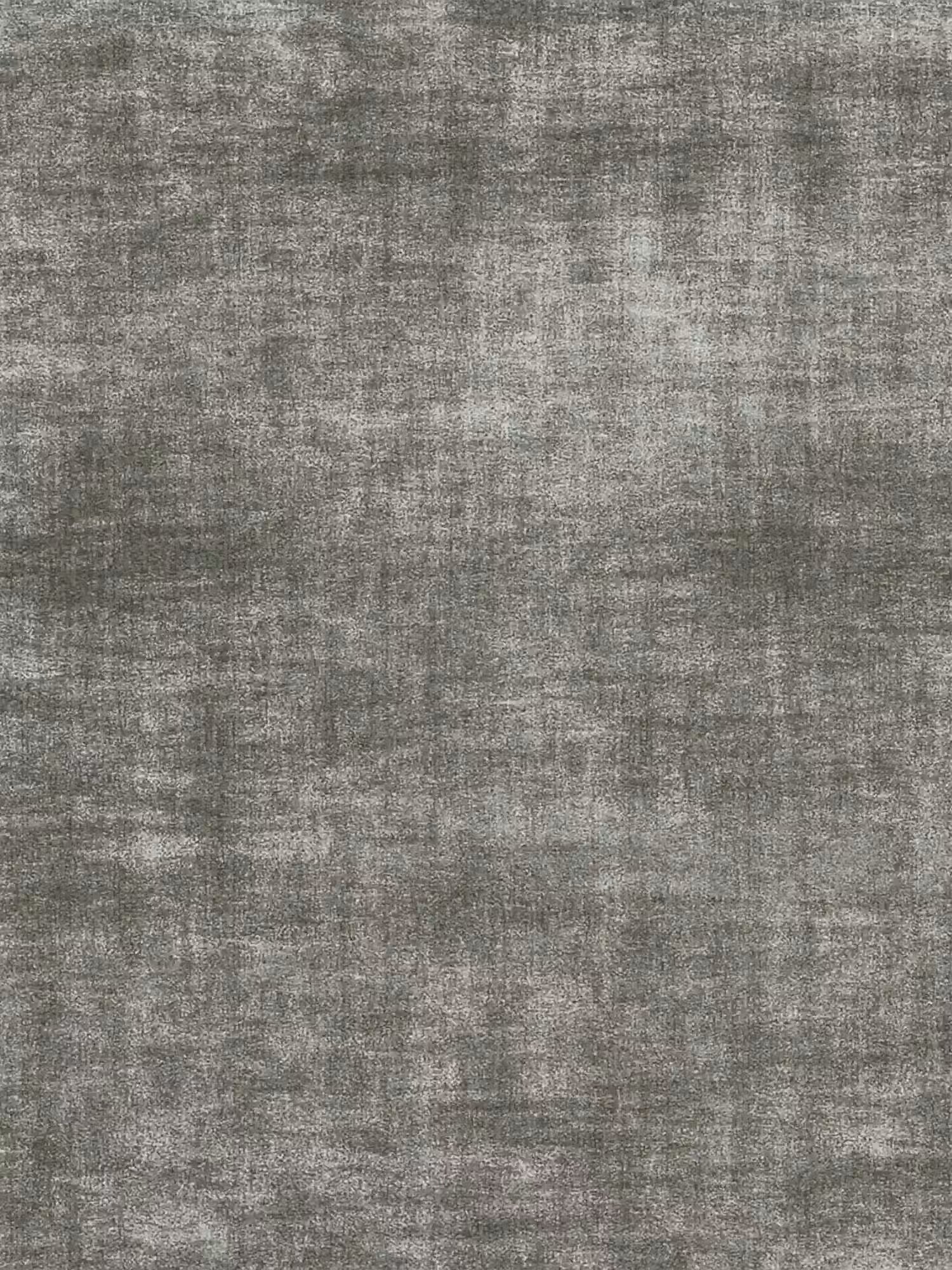 Una superficie strutturata con un motivo intrecciato simile a un tessuto, nei delicati toni del grigio e del bianco, evoca l’eleganza senza tempo del letto imbottito AURO di Letti.store, dotato di vano contenitore e testiera capitonné alta in ciniglia Oeko-Tex®. Le sottili variazioni di tonalità creano un delicato effetto invecchiato che ricorda i raffinati rivestimenti, mentre la palette cromatica complessivamente neutra richiama l’aspetto sofisticato di una classica testiera capitonné. Non sono visibili