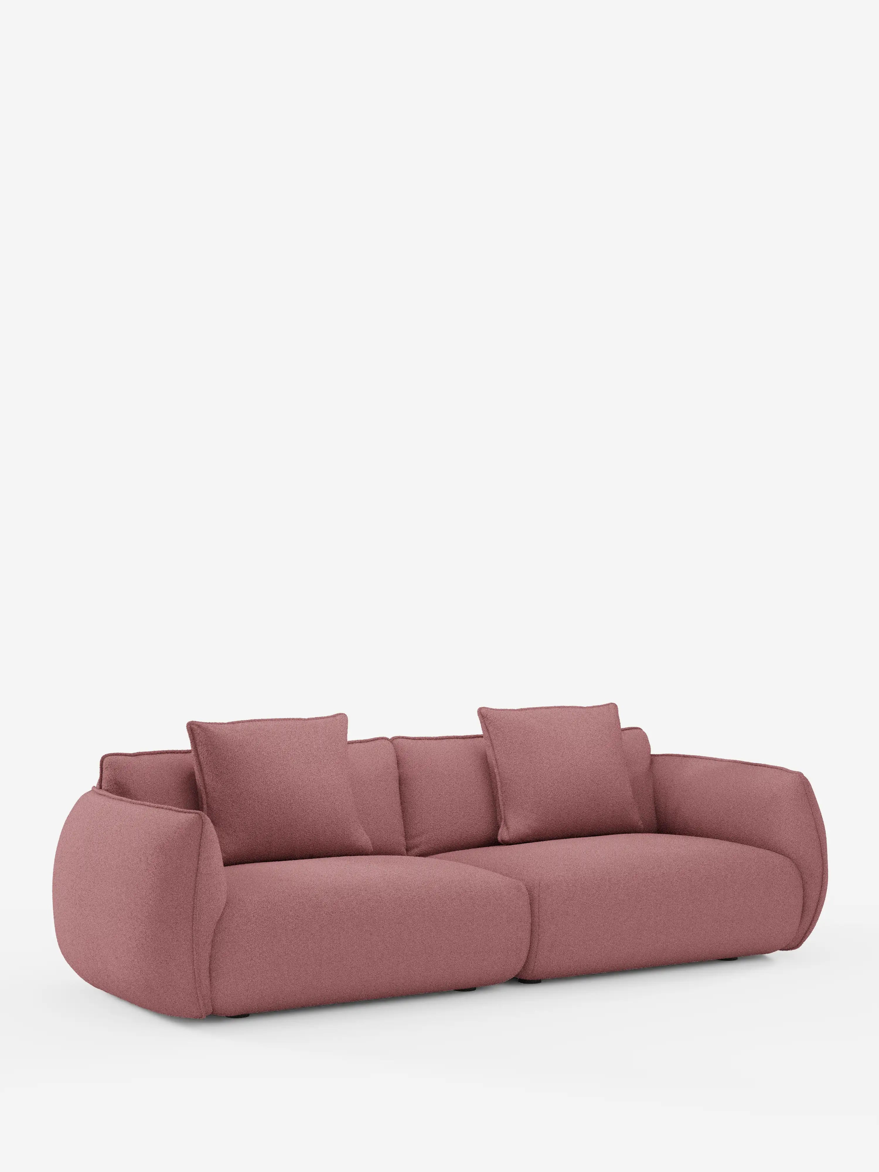 Un divano modulare e componibile Nimbus a 3 posti da 250 cm, moderno e lussuoso, nei toni del rosa malva, di Divani.Store, rivestito in tessuto sfoderabile effetto cotone resistente alle macchie (t33), con sedute profonde, braccioli larghi e due cuscini dello schienale abbinati. Il divano presenta un design morbido e arrotondato che lo rende eccezionalmente confortevole e si distingue su uno sfondo bianco a tinta unita.
