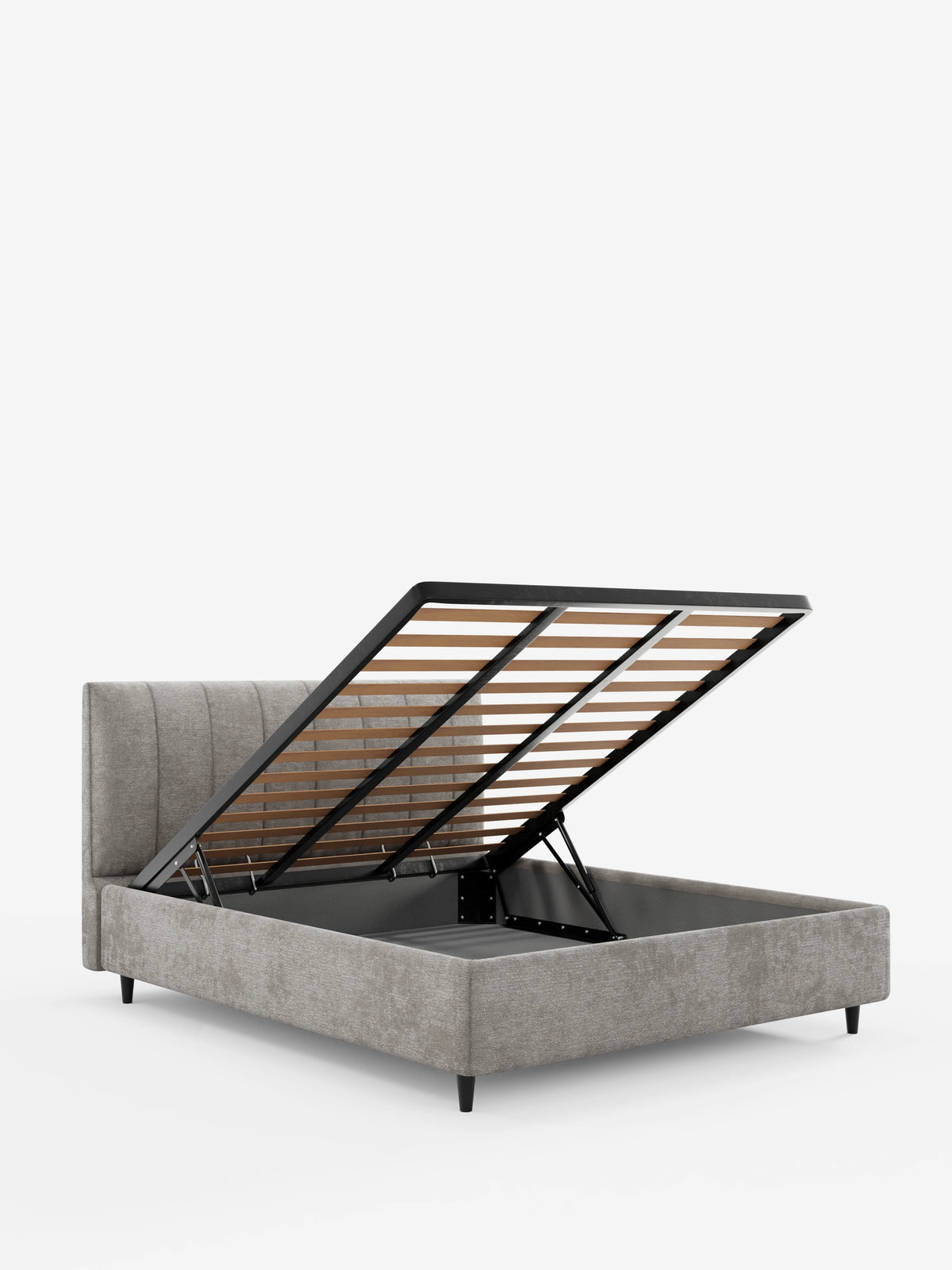 Il letto imbottito ONYX color beige, con vano contenitore e testiera verticale in tessuto certificato Oeko-Tex®, presenta una testiera alta con cuciture verticali e una base del materasso rialzata che lascia intravedere una struttura in metallo, doghe in legno e un vano contenitore.