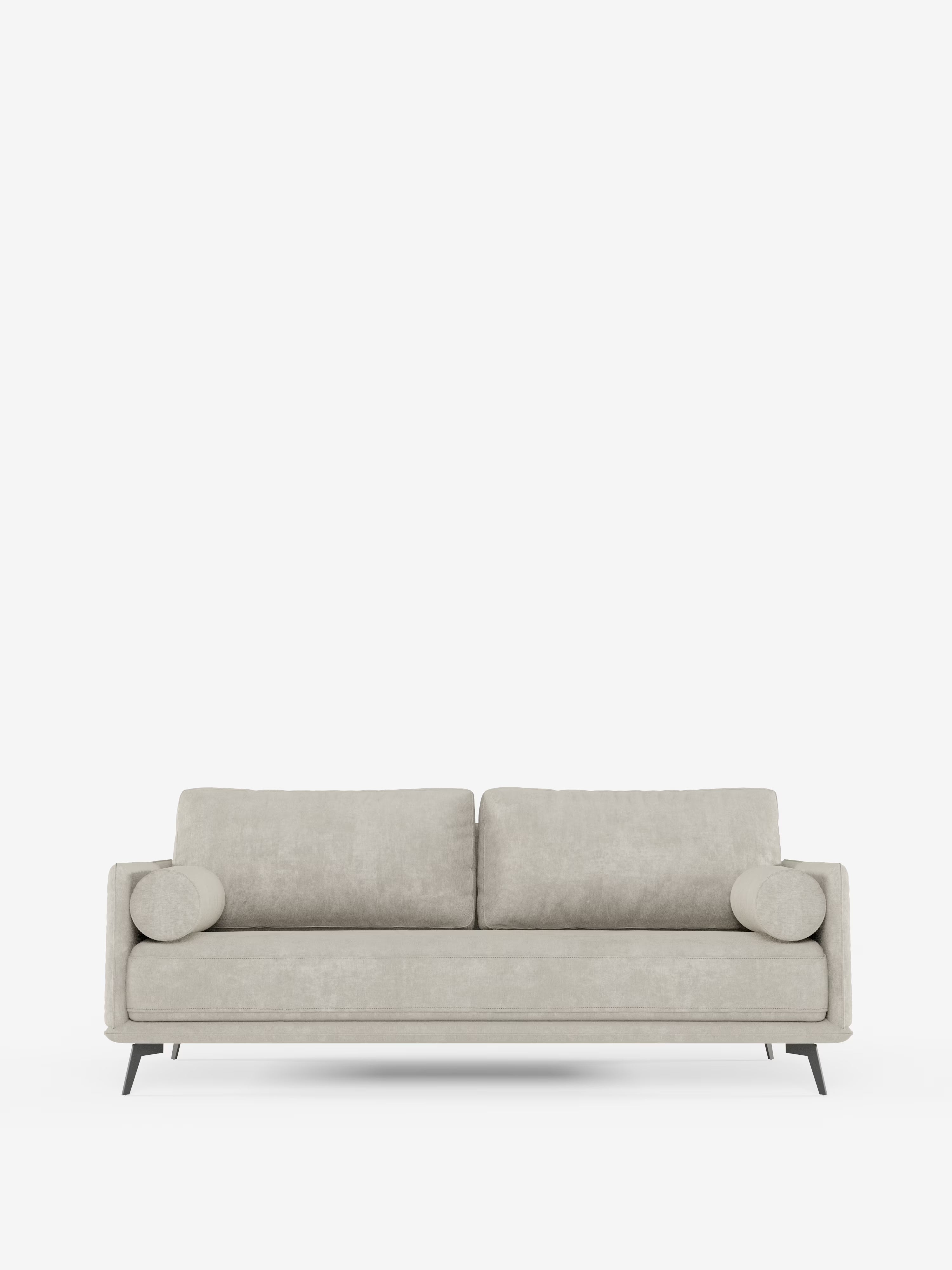 Un moderno divano lineare a 2 posti Basalto, di colore grigio chiaro, della linea Divani.Store, presenta un'unica seduta senza cuciture in tessuto T31 di facile pulizia, completata da due cuscini dello schienale e due cuscini cilindrici. Il design minimalista è esaltato dalle eleganti gambe in metallo nero, che lo rendono il divano minimalista perfetto per qualsiasi ambiente contemporaneo.
