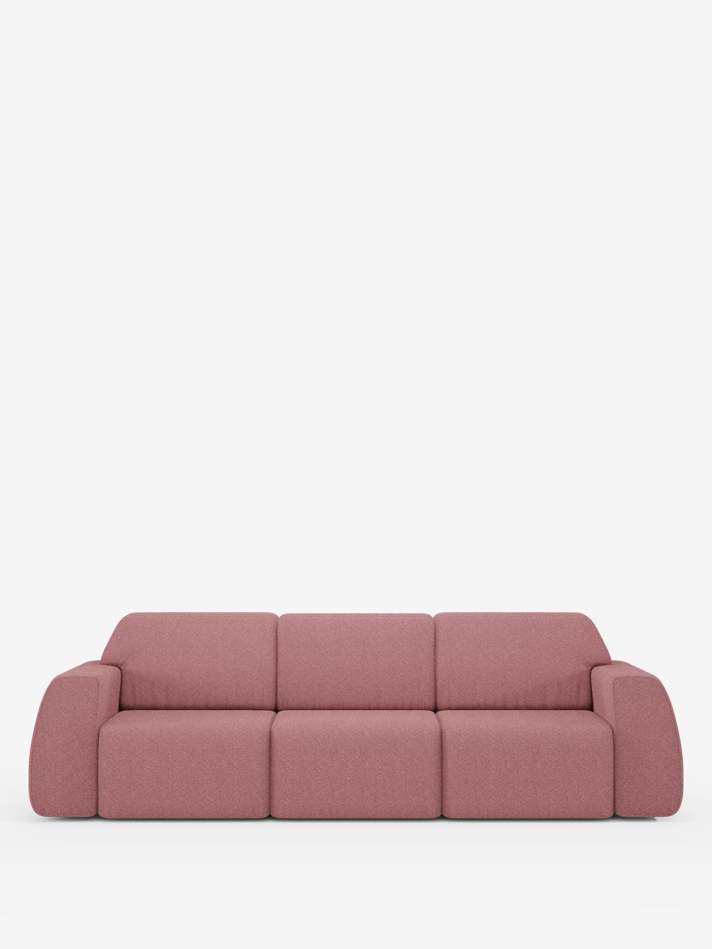Il divano Orbit, un modello contemporaneo e minimalista con 3 sedute scorrevoli e allungabili in tessuto effetto cotone smacchiabile T33 di Divani.Store, caratterizzato da una delicata tonalità rosa, tre sedute scorrevoli e allungabili in modo indipendente e braccioli arrotondati, è posizionato su uno sfondo bianco a tinta unita. La sua silhouette squadrata ma delicata, con linee pulite e un rivestimento liscio, ne esalta il fascino moderno e accogliente.