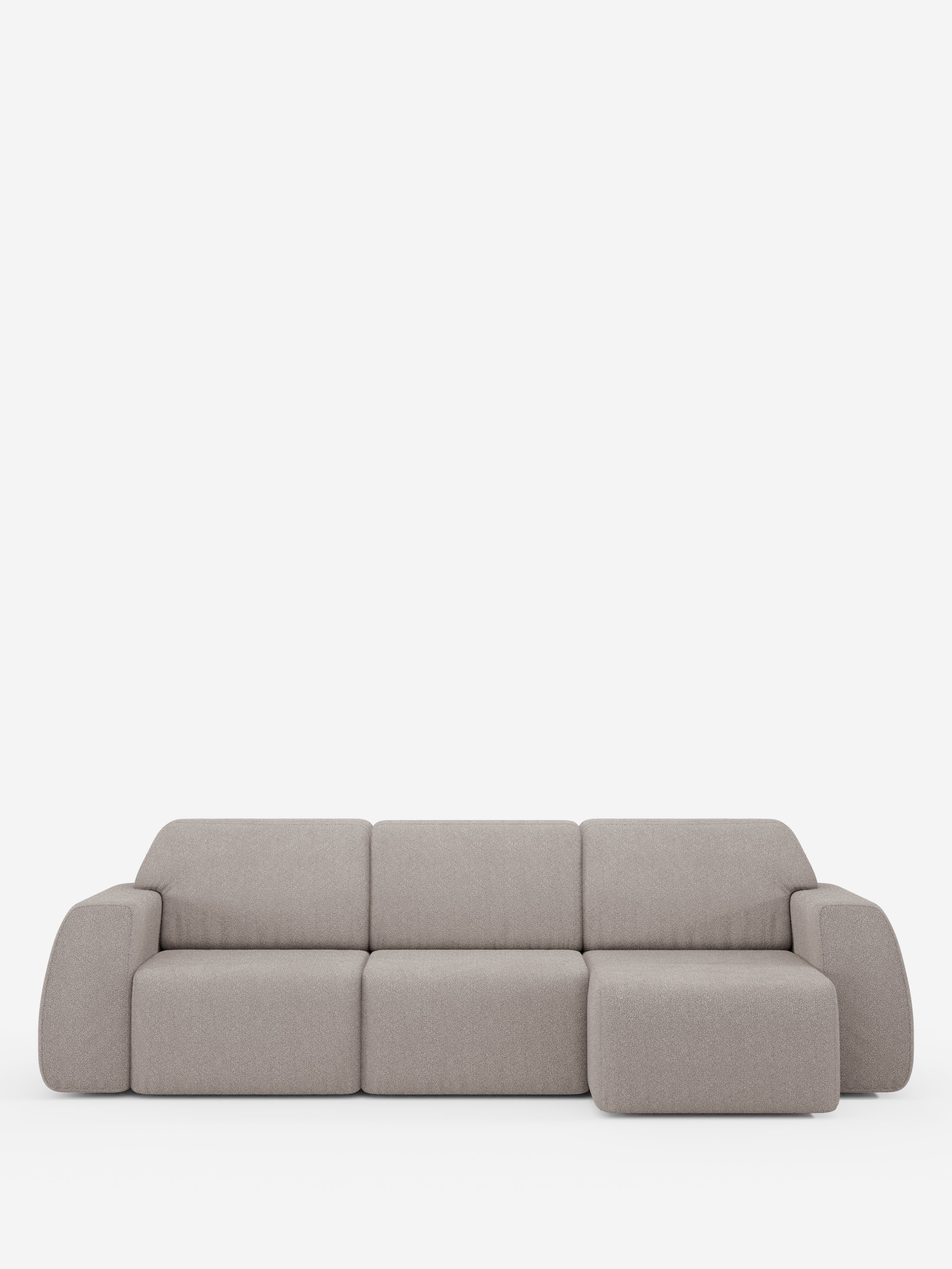 Un divano angolare contemporaneo Orbit con penisola reversibile e tutte le sedute allungabili, rivestito in tessuto smacchiabile effetto cotone T33 di Divani.Store, qui raffigurato in grigio chiaro con tre cuscini di seduta e una chaise longue integrata sulla destra. Questo divano con penisola reversibile presenta bordi morbidi e arrotondati ed è esposto su uno sfondo bianco a tinta unita.