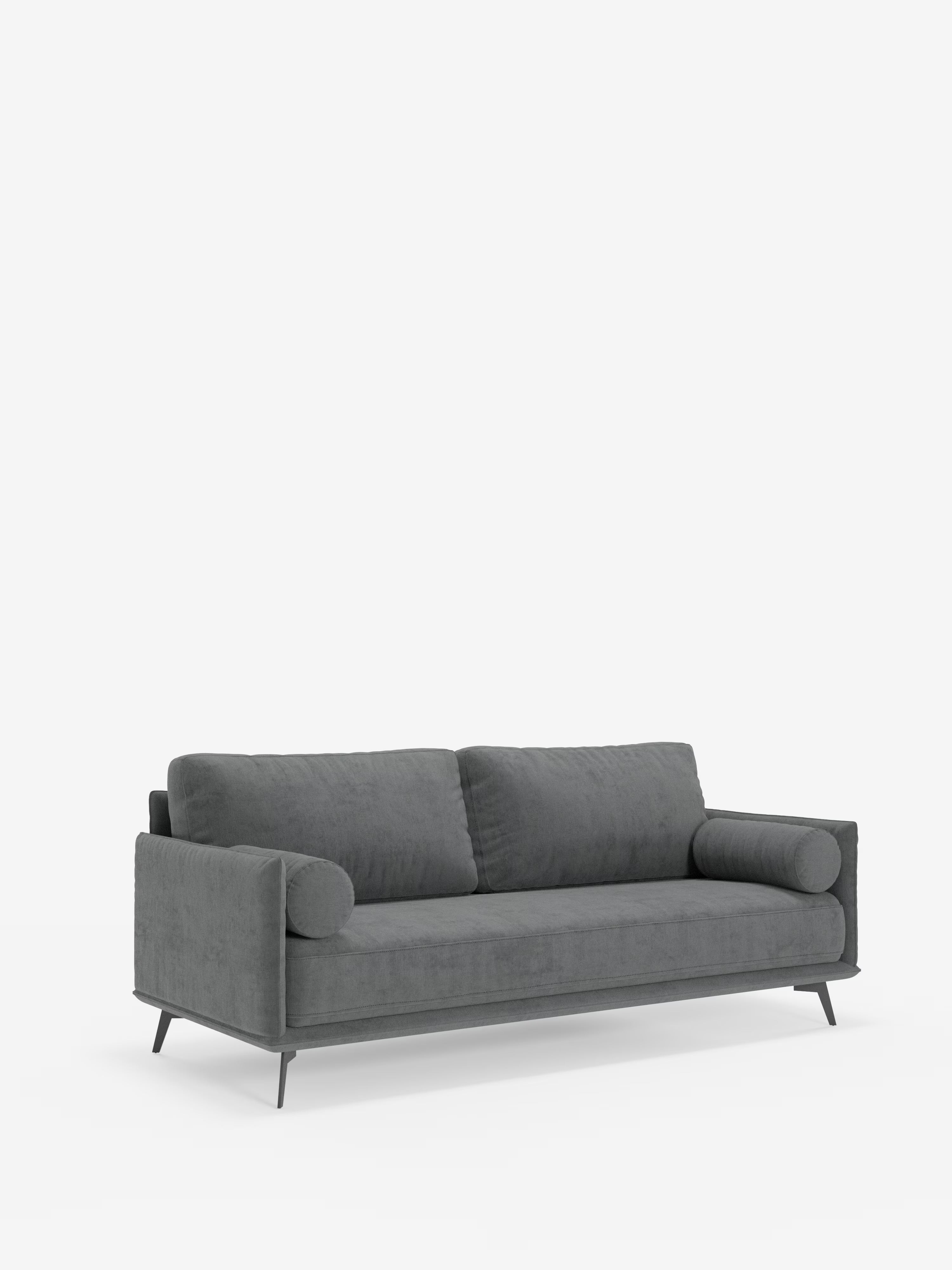Vi presentiamo il divano lineare Basalto a 2 o 3 posti di Divani.Store: un divano contemporaneo grigio caratterizzato da un esclusivo cuscino di seduta singolo, linee pulite e minimaliste e due cuscini dello schienale squadrati. Arricchito da cuscini cilindrici su ciascun bracciolo, questo elegante divano vanta una robusta base in metallo e gambe affusolate in metallo. Il divano è rivestito in tessuto T31 facile da pulire ed è fotografato su uno sfondo bianco a tinta unita.