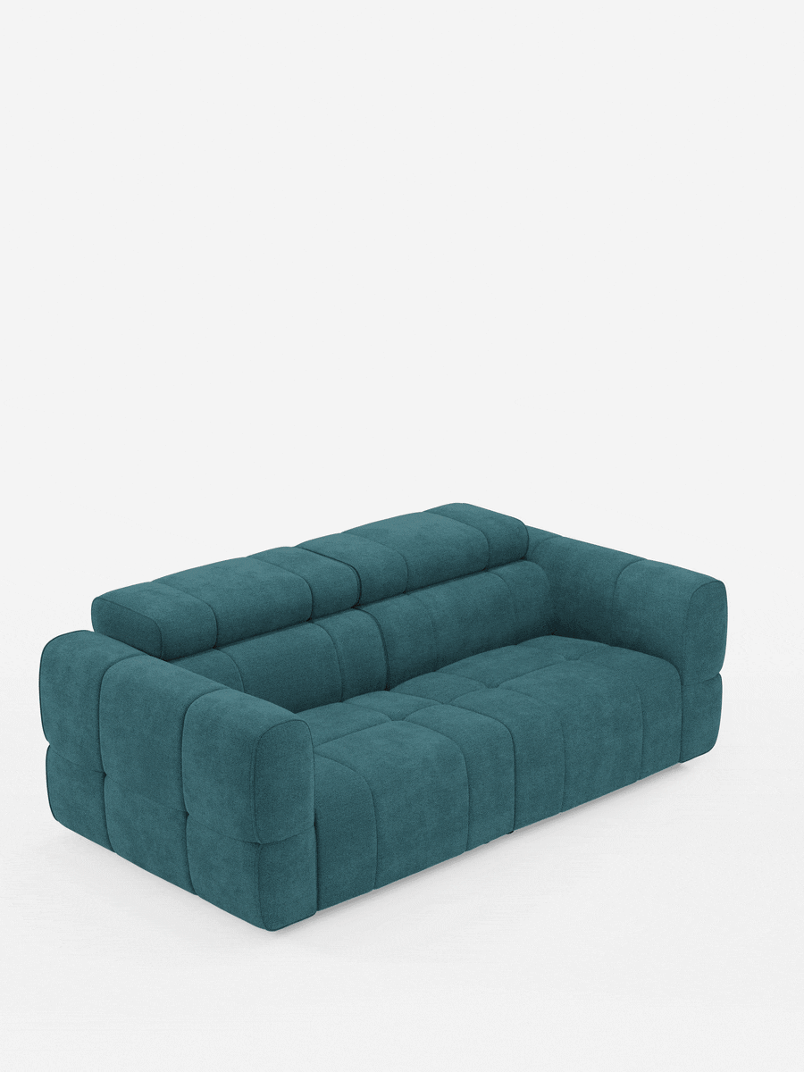 Un divano modulare Giotto a 3 posti, con poggiatesta reclinabili e funzione relax elettrica opzionale, rivestito in tessuto smacchiabile T23, caratterizzato da un design contemporaneo color verde acqua con una trama a griglia trapuntata su uno sfondo grigio chiaro.