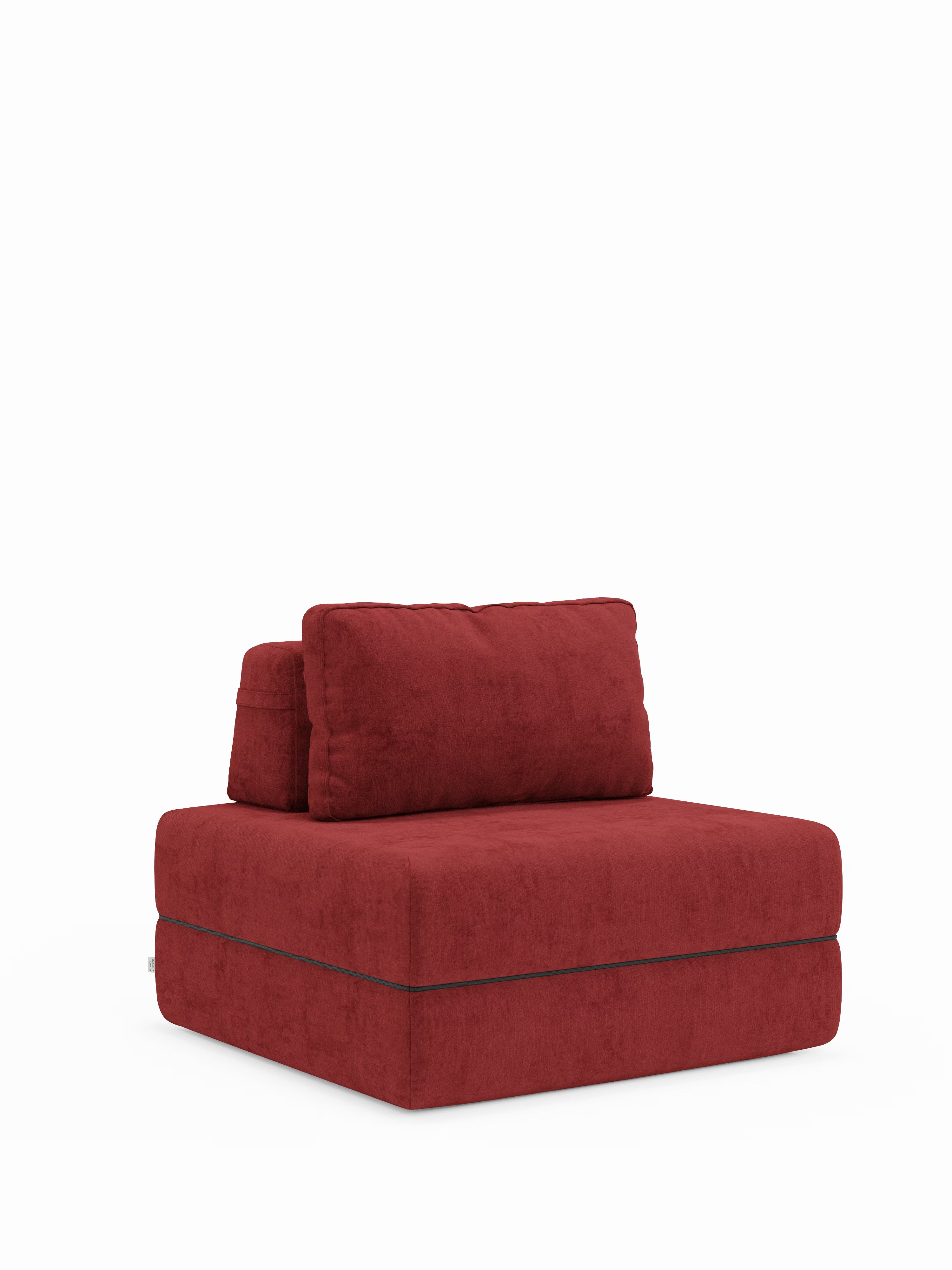 Una moderna poltrona letto Rift senza braccioli di Divani.Store, in rosso intenso, rivestita in tessuto T31 facile da pulire, caratterizzata da una seduta morbida e da un cuscino dello schienale rimovibile in tinta. Il suo design squadrato e minimalista e il materasso in memory foam alto 22 cm uniscono comfort e stile contemporaneo, il tutto su uno sfondo bianco a tinta unita.