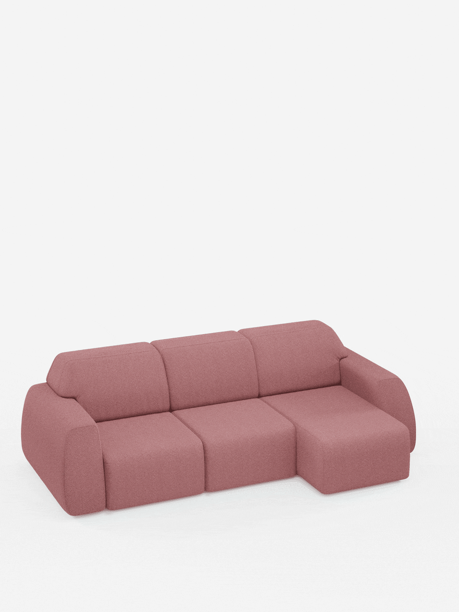 Vi presentiamo Orbit Divano angolare con penisola reversibile e tutte le sedute allungabili in tessuto smacchiabile effetto cotone T33 di Divani.Store: un moderno divano angolare modulare rosa con tre sedute principali allungabili e una chaise longue sul lato destro. Questo elegante divano presenta bordi lisci e arrotondati e un morbido tessuto effetto cotone antimacchia, che risalta magnificamente sullo sfondo bianco a tinta unita.