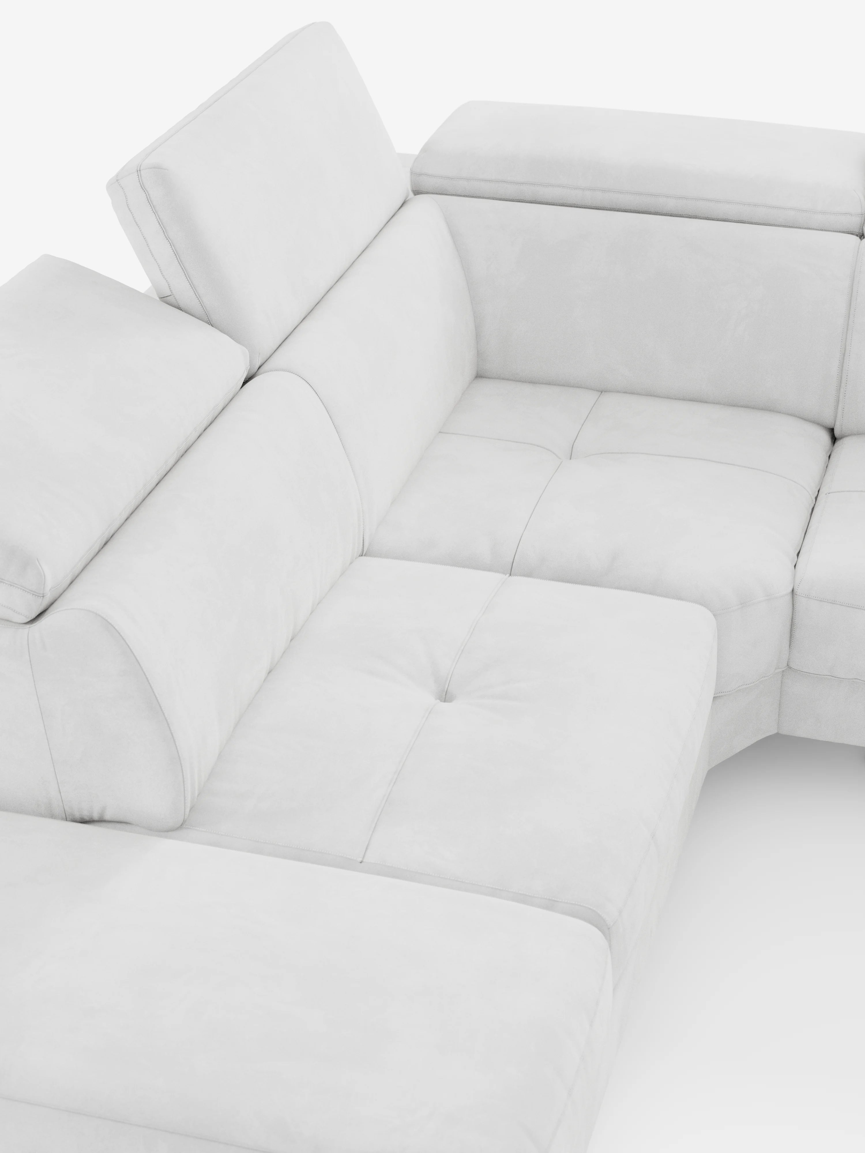 Una vista dall'alto del “Capri Divano Letto Angolare con Poggiatesta Reclinabili e Materasso ad alte prestazioni in Tessuto Vellutino Smacchiabile T30” di Divani.Store, un moderno divano componibile bianco dotato di poggiatesta regolabili, sedute ampie e cuscini morbidi. Rivestito in tessuto al tatto vellutato resistente alle macchie, questo divano offre un’estetica pulita e minimalista che incarna il design contemporaneo.