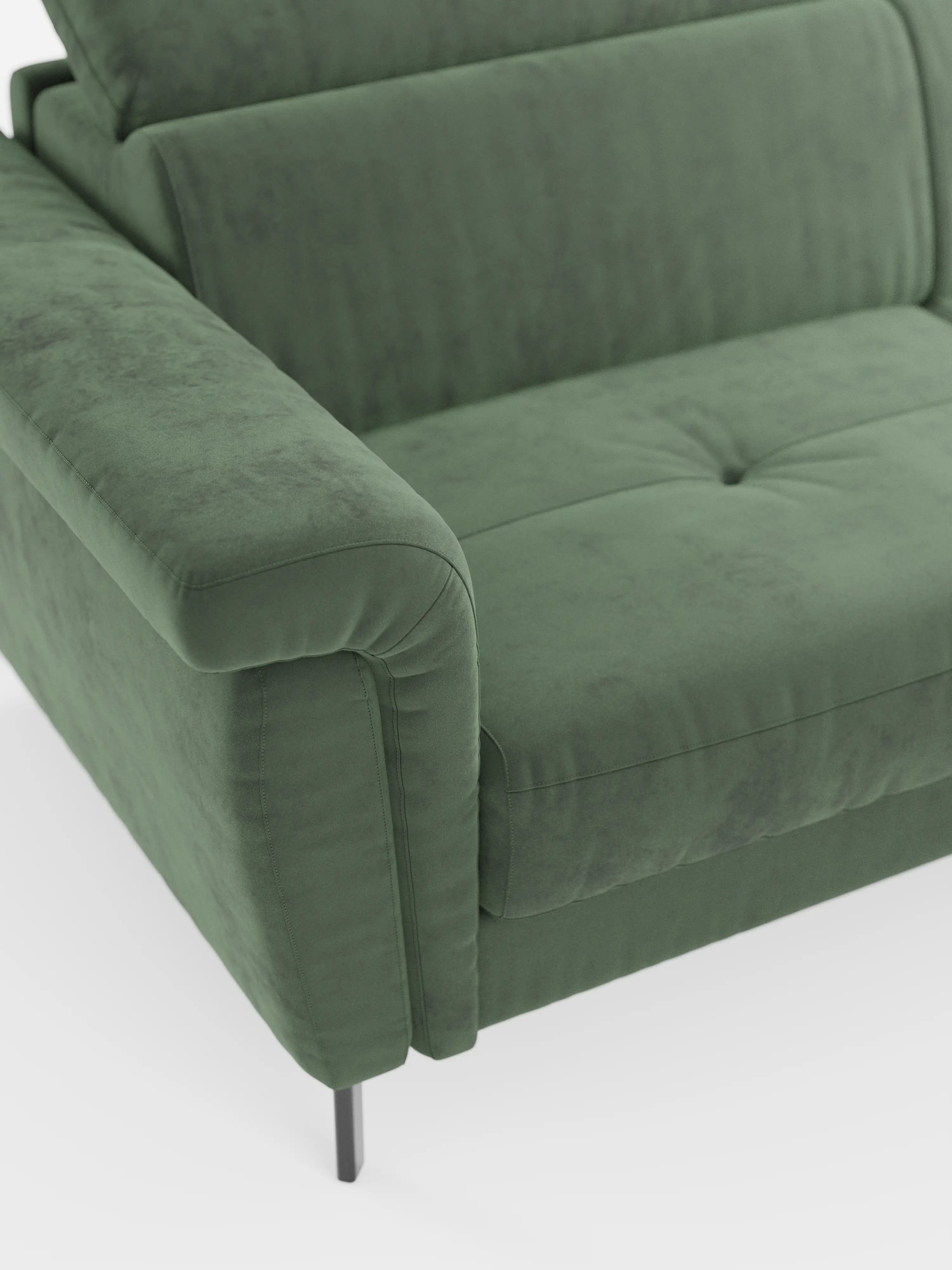 Ecco la frase modificata utilizzando i dati del prodotto: Primo piano del bracciolo sinistro e della seduta del divano letto di design Capri di Divani.Modello rivestito in elegante tessuto verde effetto velluto smacchiabile T30, resistente alle macchie, con imbottitura soffice, delicata trapuntatura della seduta e sottili piedini in metallo nero che mettono in risalto la raffinata maestria artigianale italiana, il tutto su uno sfondo bianco.