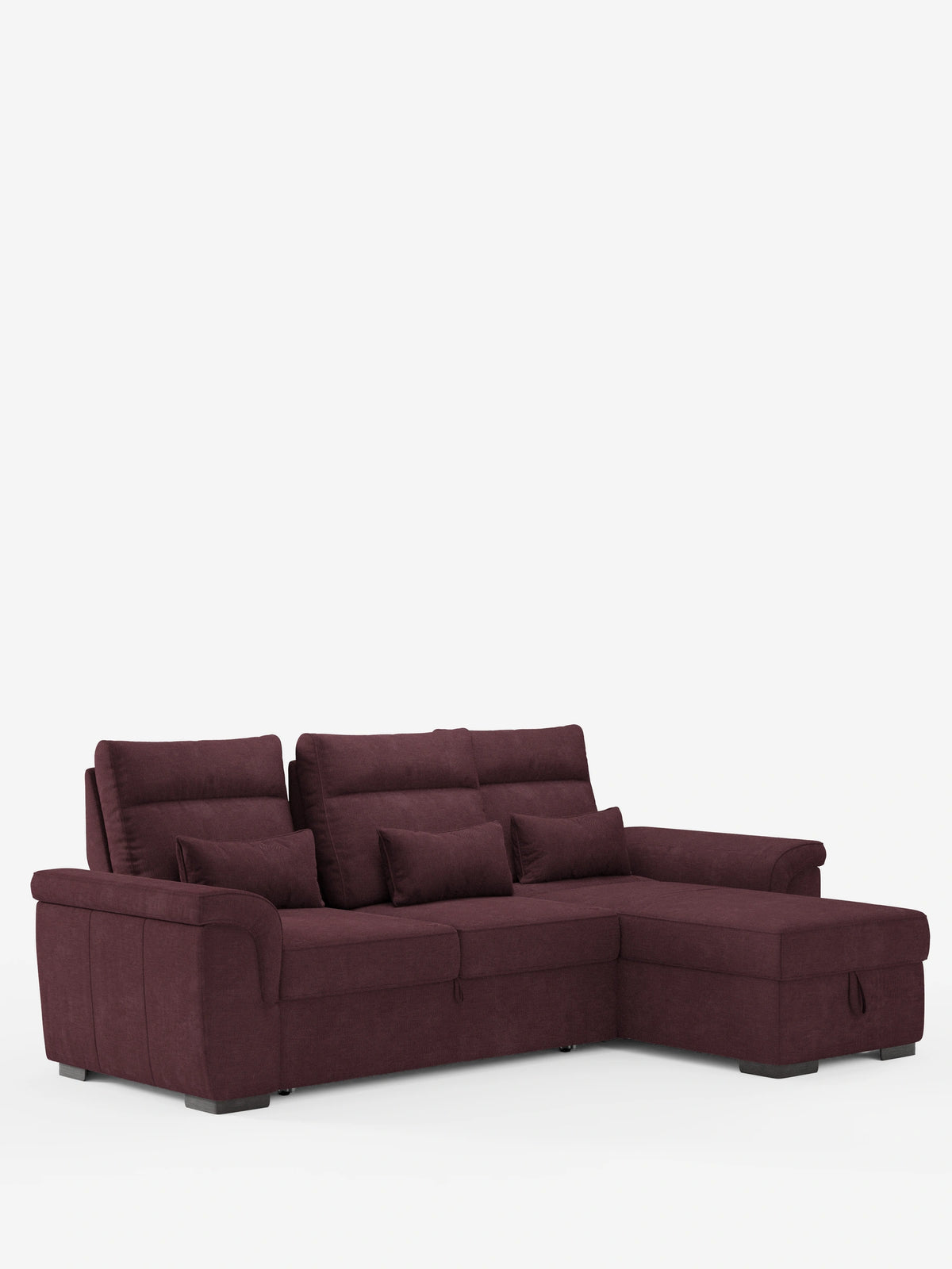 Un divano letto angolare Ischia color bordeaux scuro con schienali scorrevoli, elemento estraibile e penisola contenitore in tessuto smacchiabile misto lino, dotato di chaise longue a destra, schienali regolabili e tre cuscini decorativi.