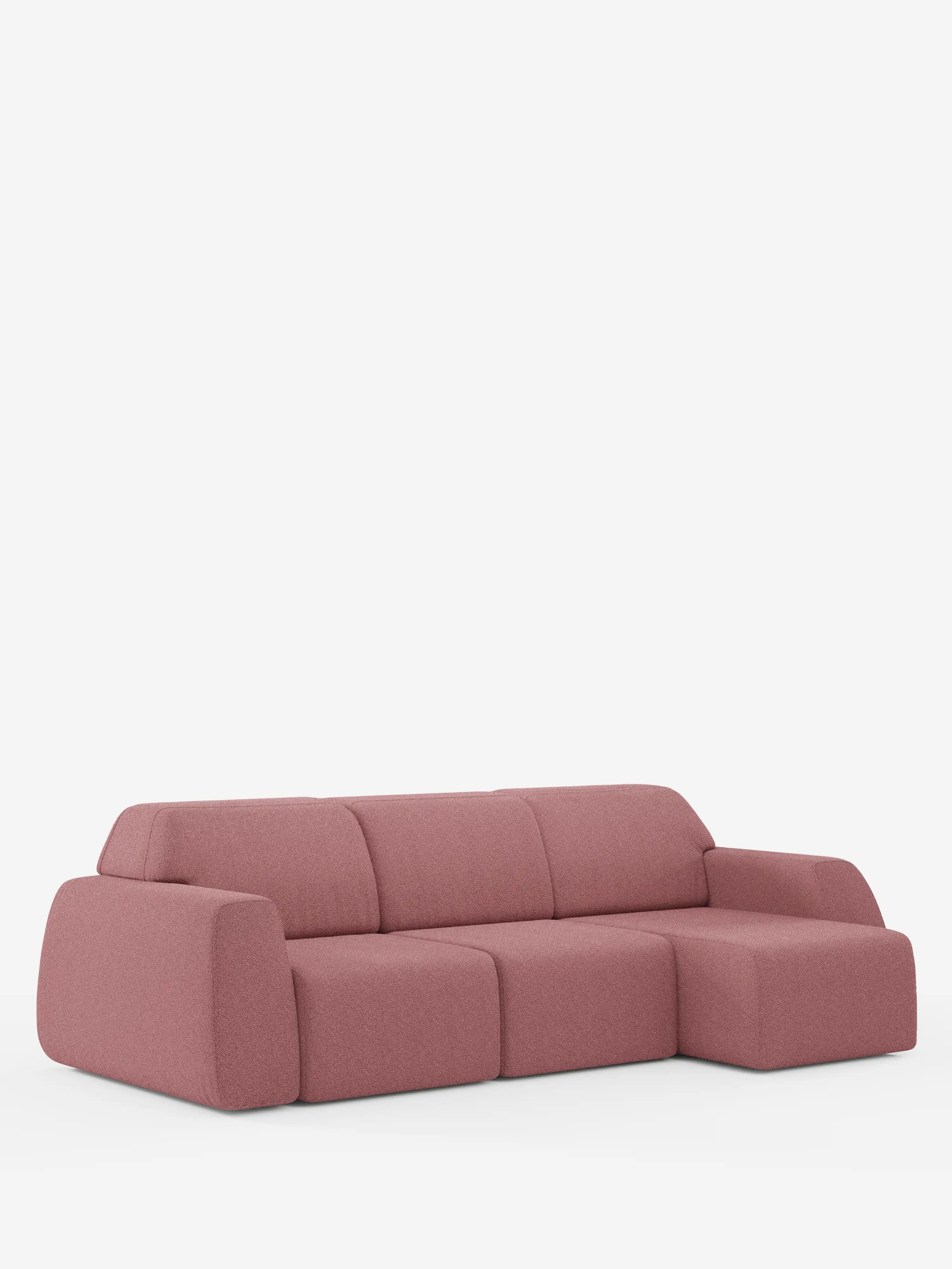 Un divano angolare Orbit contemporaneo di Divani.Store, rivestito in tessuto T33 effetto cotone color rosa polveroso e resistente alle macchie, caratterizzato da bordi arrotondati, ampi braccioli e una sezione chaise longue reversibile sul lato destro, presentato su uno sfondo bianco a tinta unita. Tutte le sedute sono allungabili per un maggiore comfort.