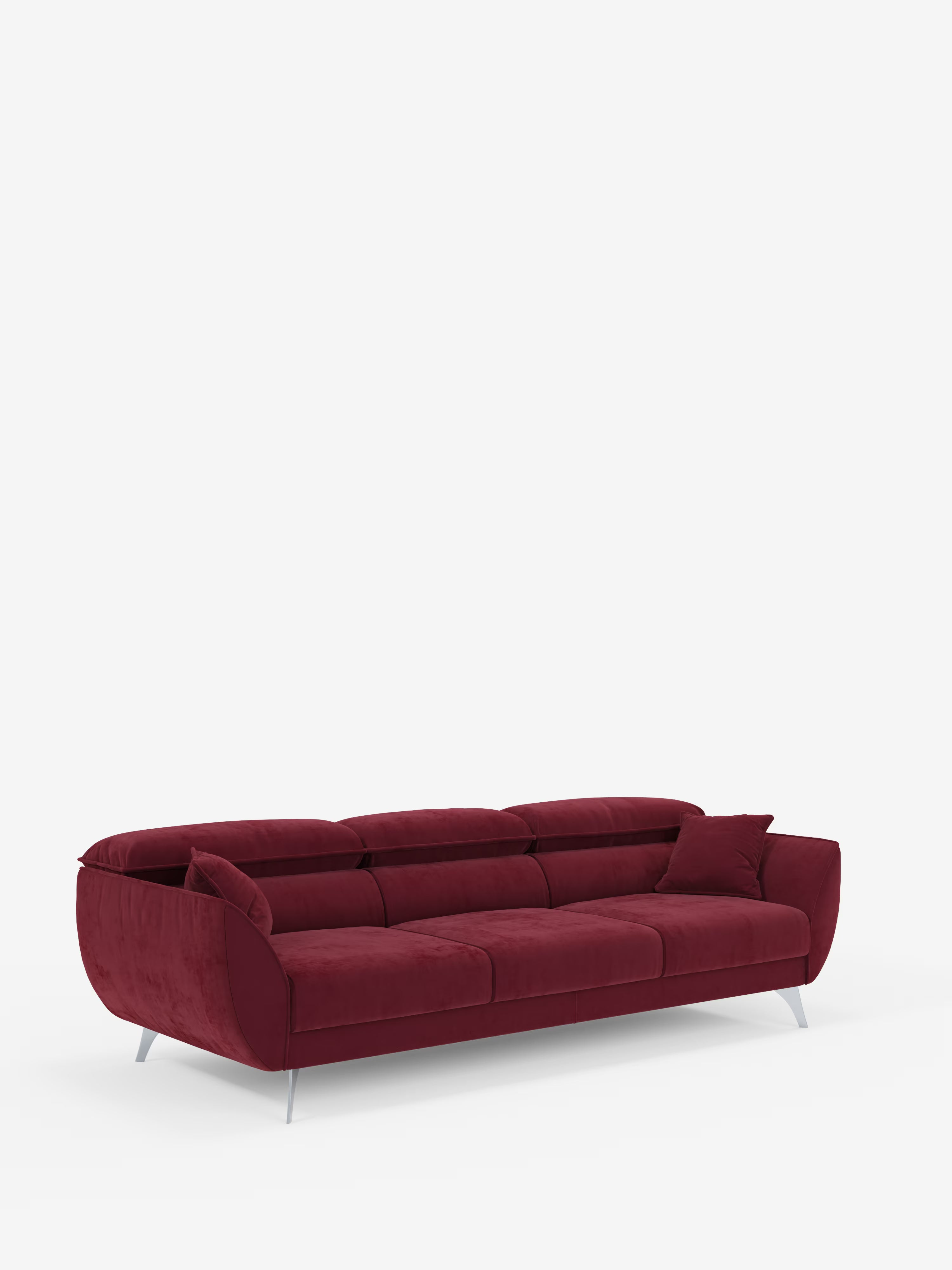 Il divano Michelangelo 4 Posti di Divani.Store è un moderno divano in velluto rosso intenso dotato di tre sedute estensibili, poggiatesta reclinabili, braccioli dalle linee elegantemente sinuose, sottili gambe in metallo e un cuscino decorativo sul lato destro. Rivestito in tessuto T30 antimacchia e su uno sfondo bianco a tinta unita, è l’aggiunta perfetta a un soggiorno moderno.