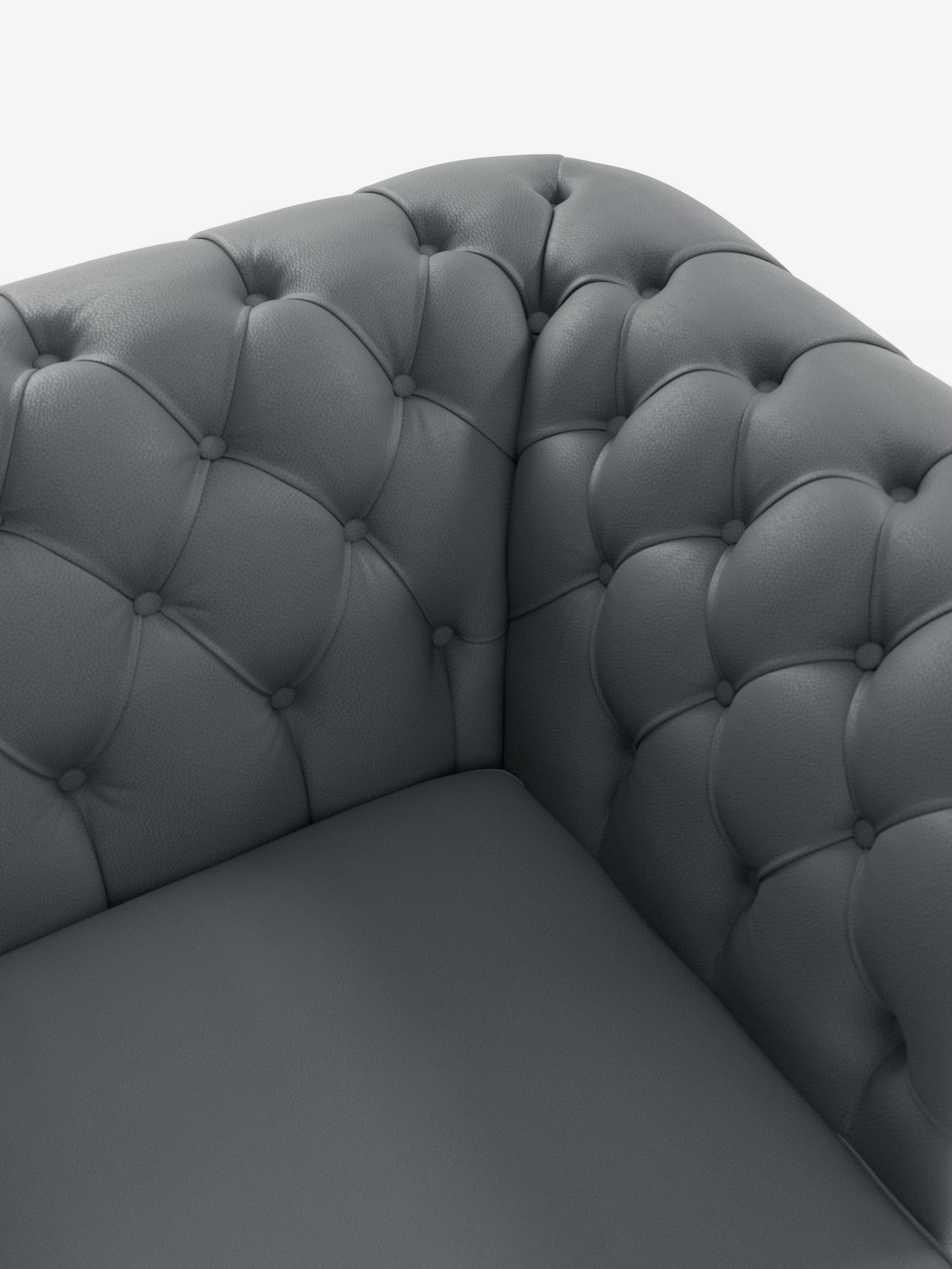 Primo piano di una poltrona in pelle grigio scuro trapuntata con dettagli a bottoni. Realizzata con maestria da Divani.Store, la Chester 4 Posti 3 sedute in Vera Pelle – Chesterfield Capitonné Artigianale presenta schienale e braccioli curvi, che mettono in risalto la texture lussuosa e le cuciture precise del rivestimento in vera pelle su uno sfondo bianco a tinta unita.