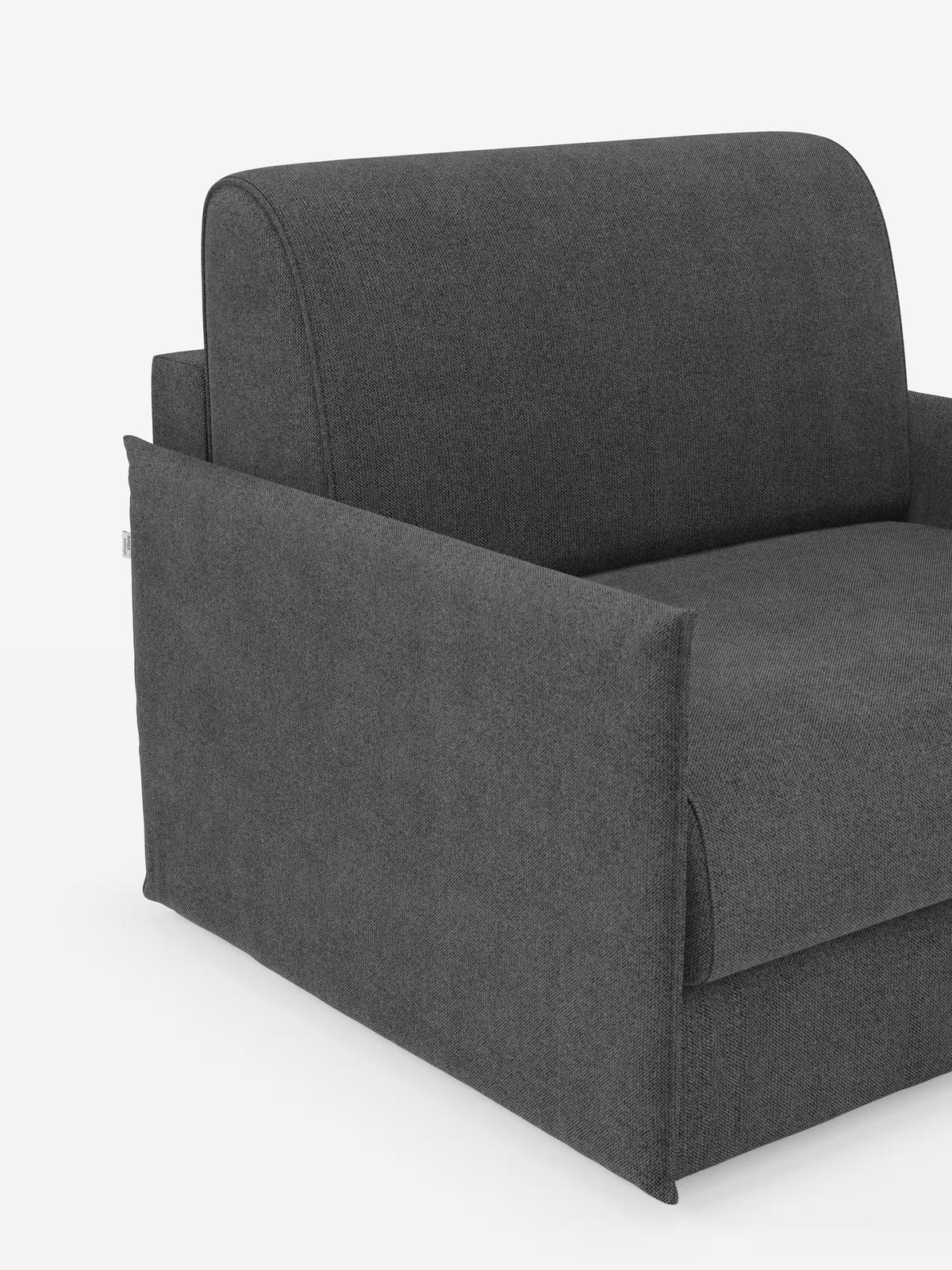 Una poltrona letto compatta Evans in stile contemporaneo con materasso, disponibile su Divani.Store, rivestita in tessuto sfoderabile e antimacchia T23 grigio scuro, si caratterizza per le linee pulite e i braccioli squadrati. Il tessuto testurizzato aggiunge un tocco di interesse visivo, mentre il design compatto si adagia perfettamente su una superficie piana contro uno sfondo bianco a tinta unita. Sono visibili solo alcune parti della seduta, dello schienale e dei braccioli: una soluzione versatile e