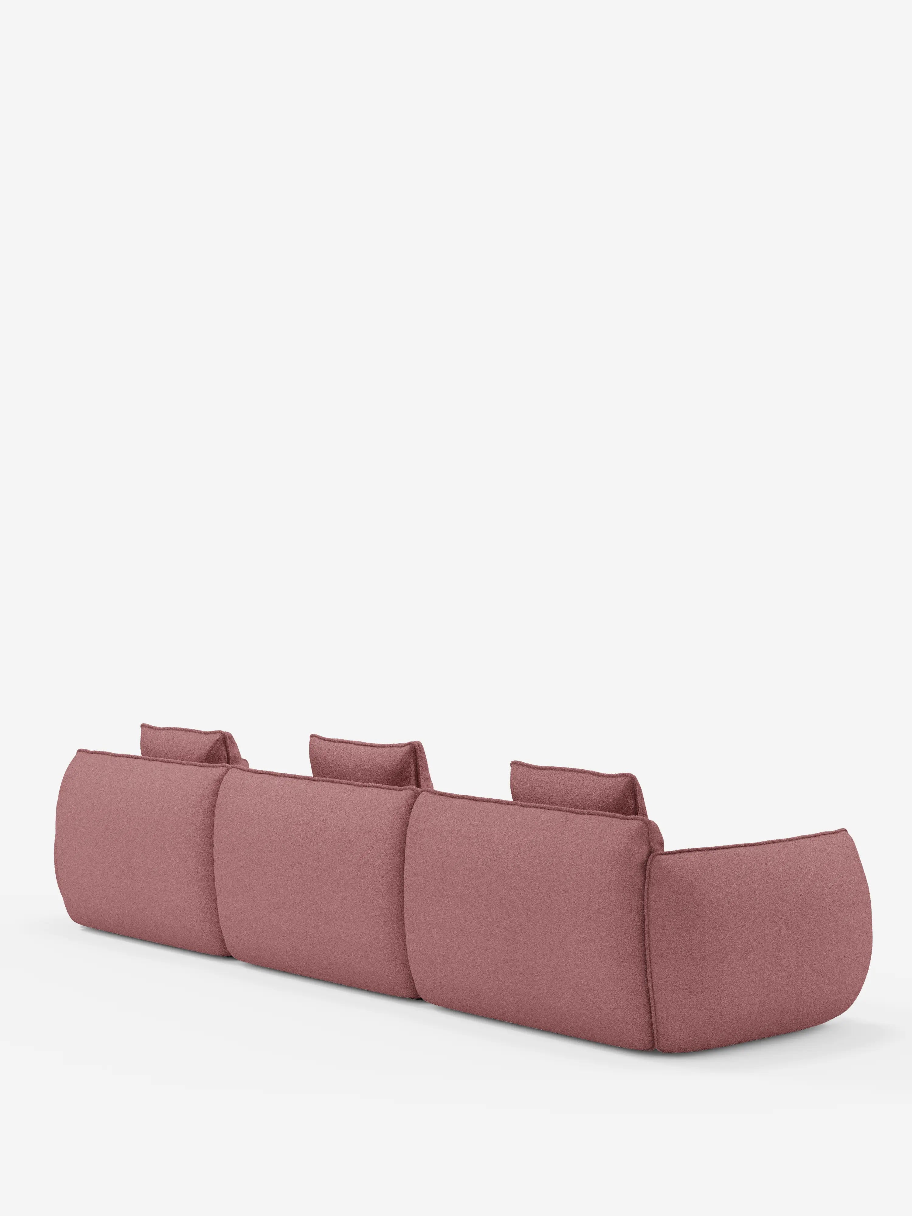 Il divano modulare a 3 posti Nimbus, realizzabile in morbido tessuto smacchiabile effetto cotone T33 di Divani.Store, è raffigurato di retro. È caratterizzato da tre ampie sezioni di seduta e tre cuscini rettangolari per lo schienale dai bordi lisci e arrotondati. Il design minimalista risalta sullo sfondo bianco.