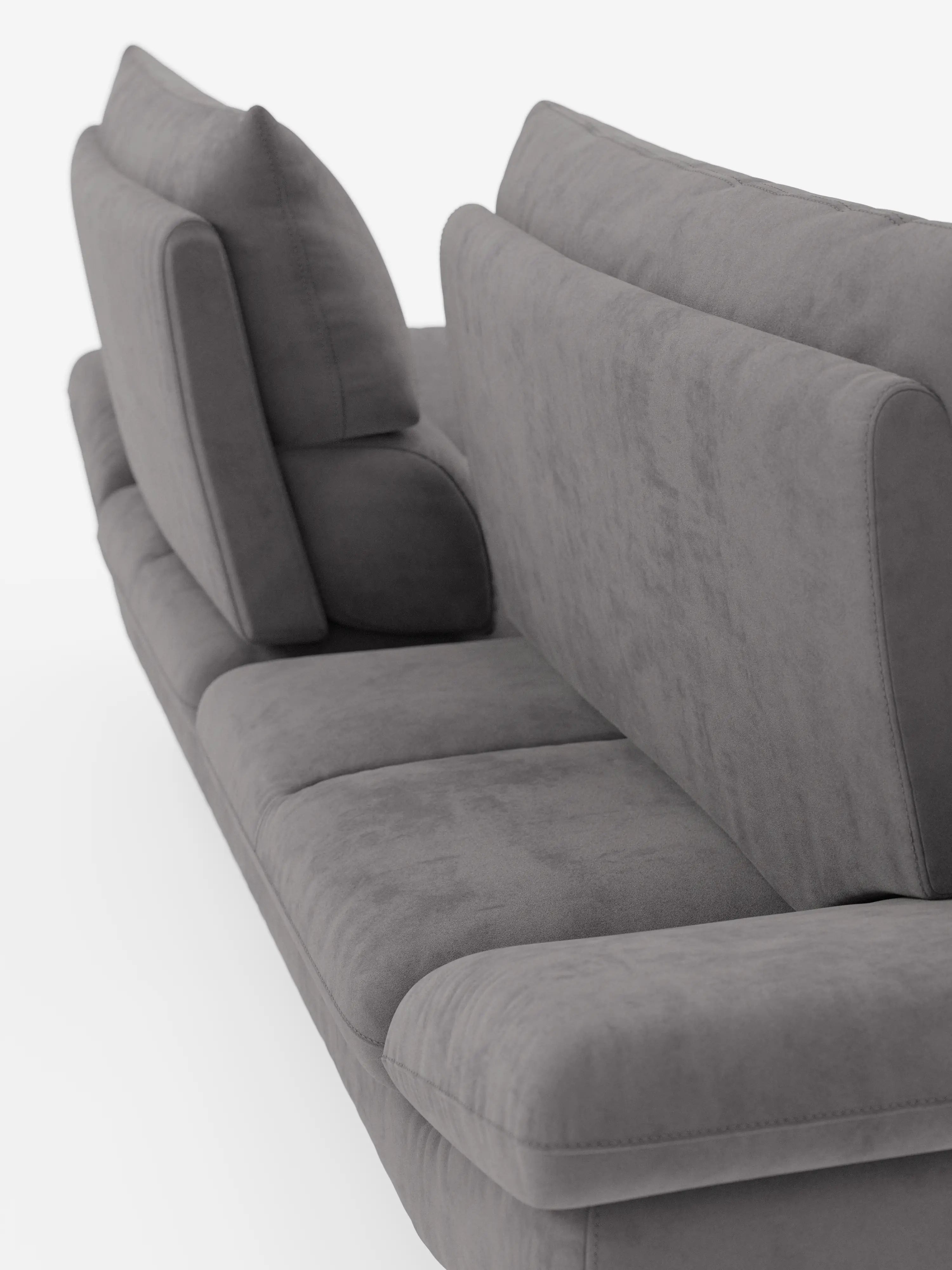 Primo piano del divano Eclipse dal design moderno a 2 e 3 posti con schienali traslanti di Divani.Store, caratterizzato da cuscini morbidi e spessi e da un rivestimento in morbida ed elegante microfibra smacchiabile T11. L’immagine mostra il divano ripreso di profilo, mettendone in risalto la texture liscia, la base sospesa con piedini alti e gli schienali regolabili che esaltano il comfort e lo stile contemporaneo su uno sfondo bianco a tinta unita.