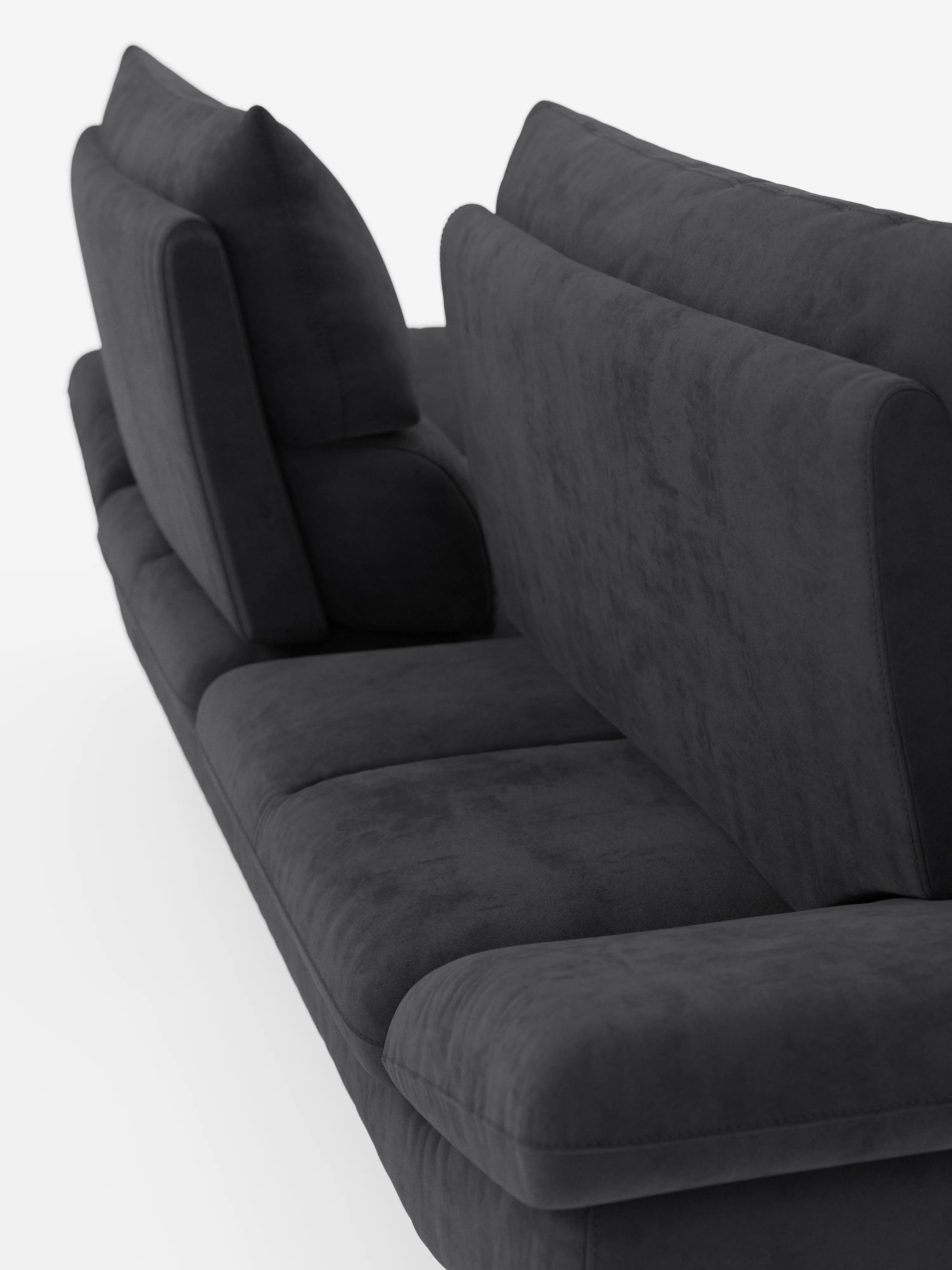 Un primo piano dell’Eclipse Divano dal design moderno di Divani.Store, un raffinato divano disponibile nella versione a 2 o 3 posti, rivestito in elegante microfibra T11 resistente alle macchie. L’immagine mette in risalto la morbida seduta, gli schienali regolabili (schienali traslanti) e i braccioli da un’angolazione che esalta i piedini alti e le linee minimaliste su uno sfondo bianco a tinta unita, sottolineando l’eleganza contemporanea di questo divano firmato Divani.Store.