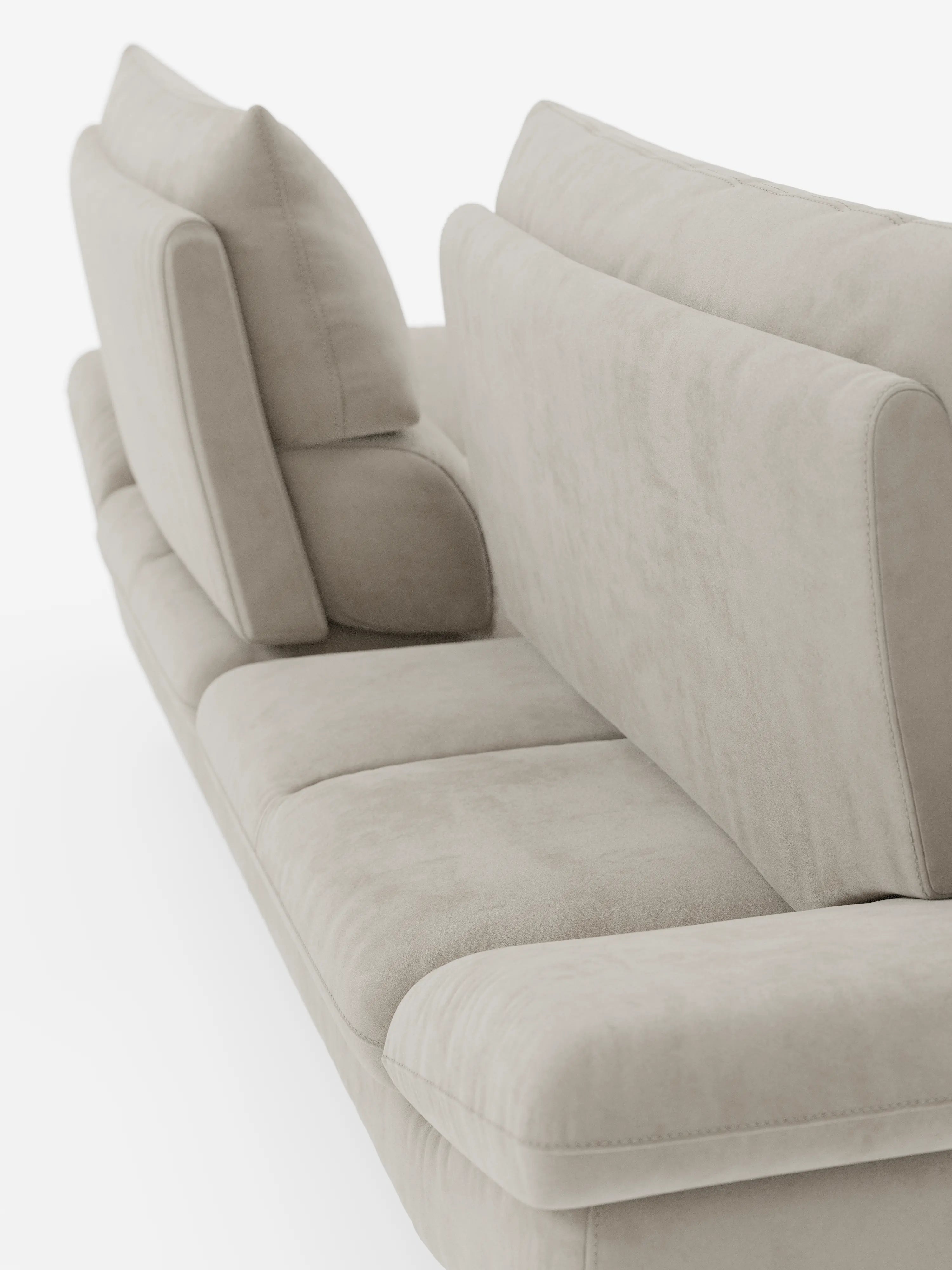 Un primo piano del divano Eclipse, dal design moderno, a 2 e 3 posti con schienali traslanti, di Divani.Store, caratterizzato da morbidi e soffici cuscini e da un rivestimento liscio e imbottito in elegante microfibra T11 resistente alle macchie. Gli schienali traslanti leggermente inclinati e gli eleganti piedini alti in metallo creano un’estetica pulita e minimalista su uno sfondo bianco.