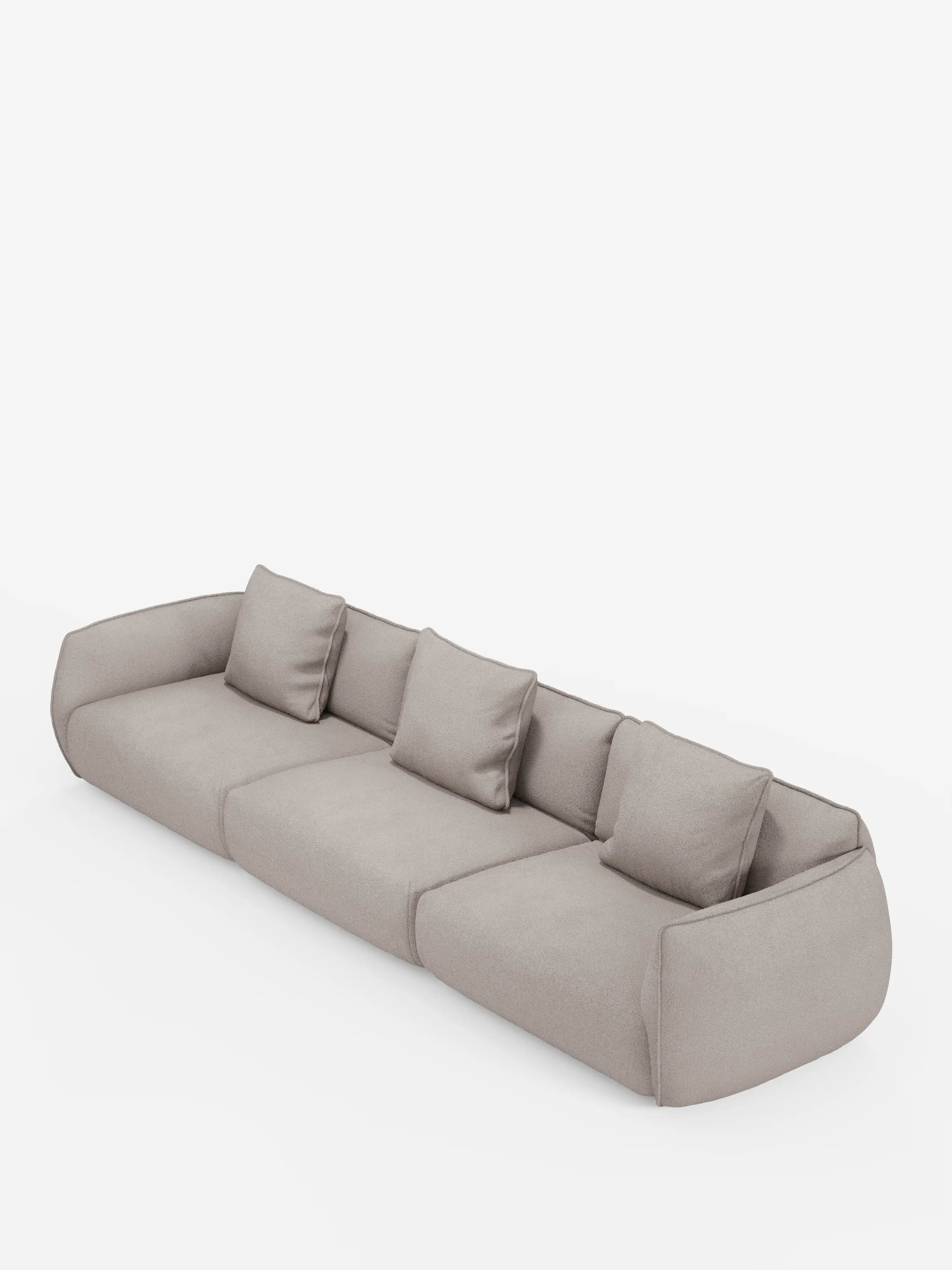Un divano modulare contemporaneo Nimbus grigio chiaro a 3 posti di Divani.Store, rivestito in morbido tessuto effetto cotone antimacchia (T33), caratterizzato da bordi arrotondati e morbidi e da tre cuscini quadrati coordinati. Su uno sfondo bianco, questo divano modulare si distingue per lo schienale basso e il design minimalista e accogliente.
