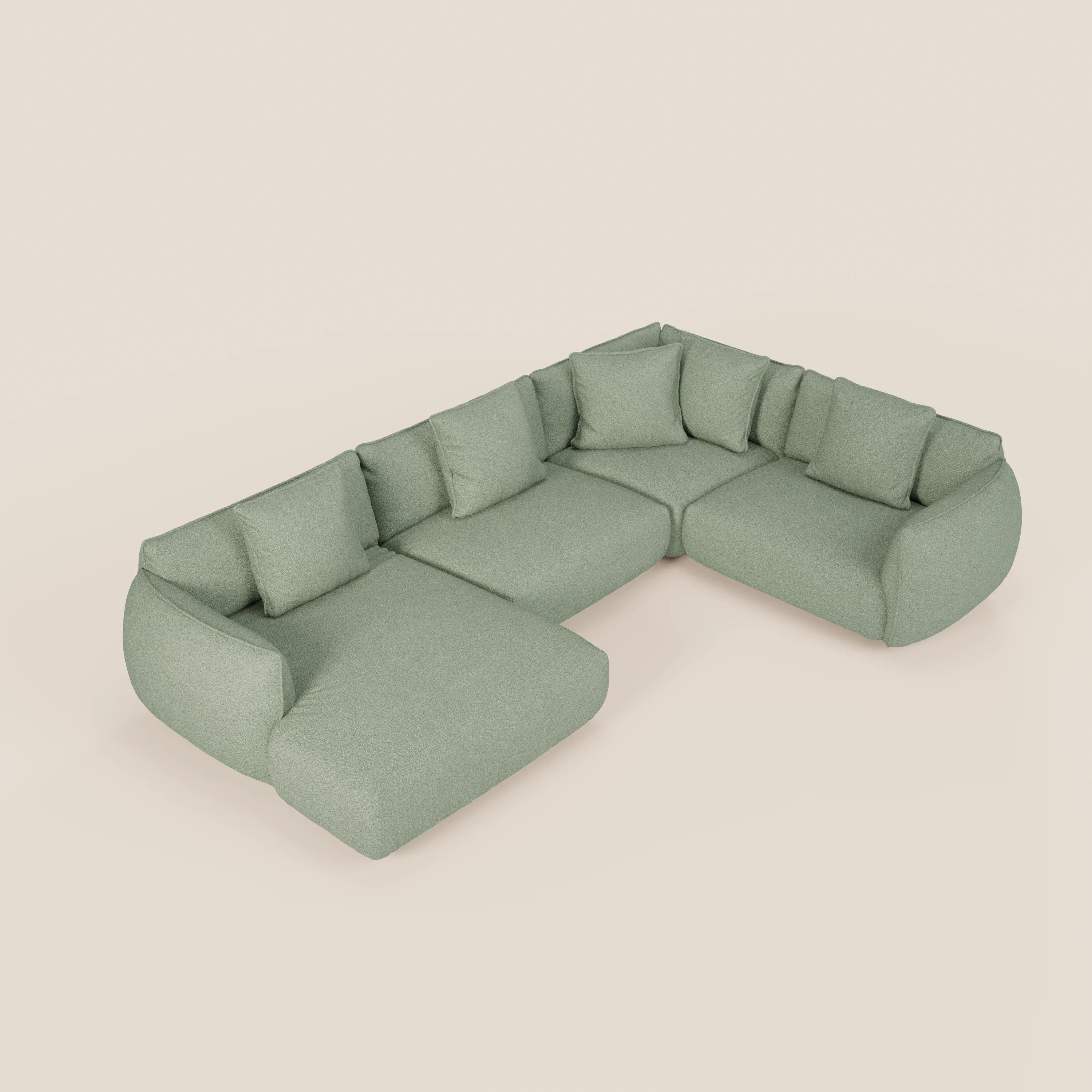 Il divano angolare panoramico Nimbus di Divani.Store è un moderno componibile verde chiaro con sei cuscini di schienale e una chaise lounge sul lato sinistro, caratterizzato da un tessuto antimacchia e da un elegante design basso e arrotondato.