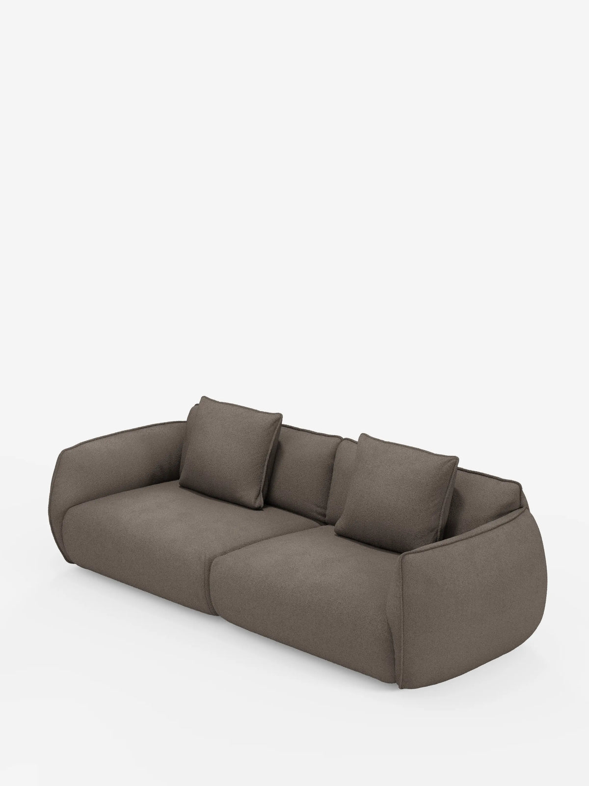 Un moderno divano Nimbus a 3 posti, dal profilo basso e di colore marrone, modulare e componibile di Divani.Store, caratterizzato da spigoli arrotondati e da un rivestimento in morbido tessuto effetto cotone resistente alle macchie. Due ampie sezioni di seduta e tre cuscini quadrati abbinati poggiano contro lo schienale leggermente inclinato, il tutto su uno sfondo bianco a tinta unita.