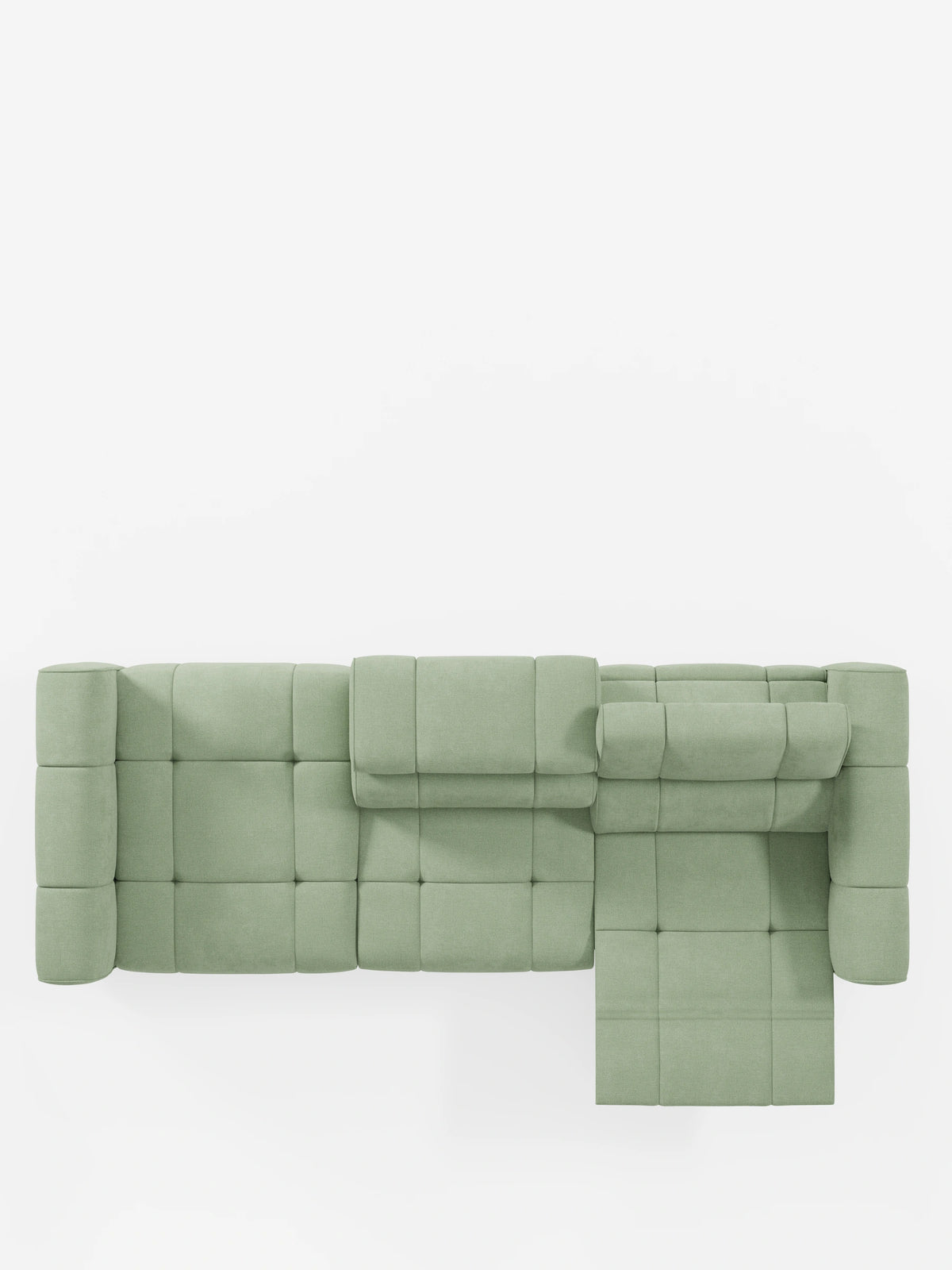 Vista dall'alto di un divano componibile Giotto color verde salvia con terminale aperto - opzione relax elettrico in tessuto smacchiabile T23, caratterizzato da una superficie trapuntata con motivo a griglia, una sezione di seduta allungata e due poggiatesta verticali.