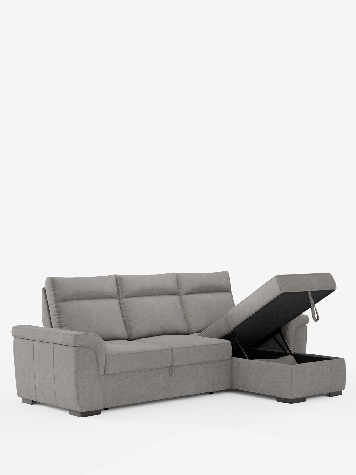 Un divano letto angolare grigio “Ischia” con schienali scorrevoli, in tessuto, su uno sfondo bianco, con la chaise longue aperta a rivelare un vano portaoggetti.
