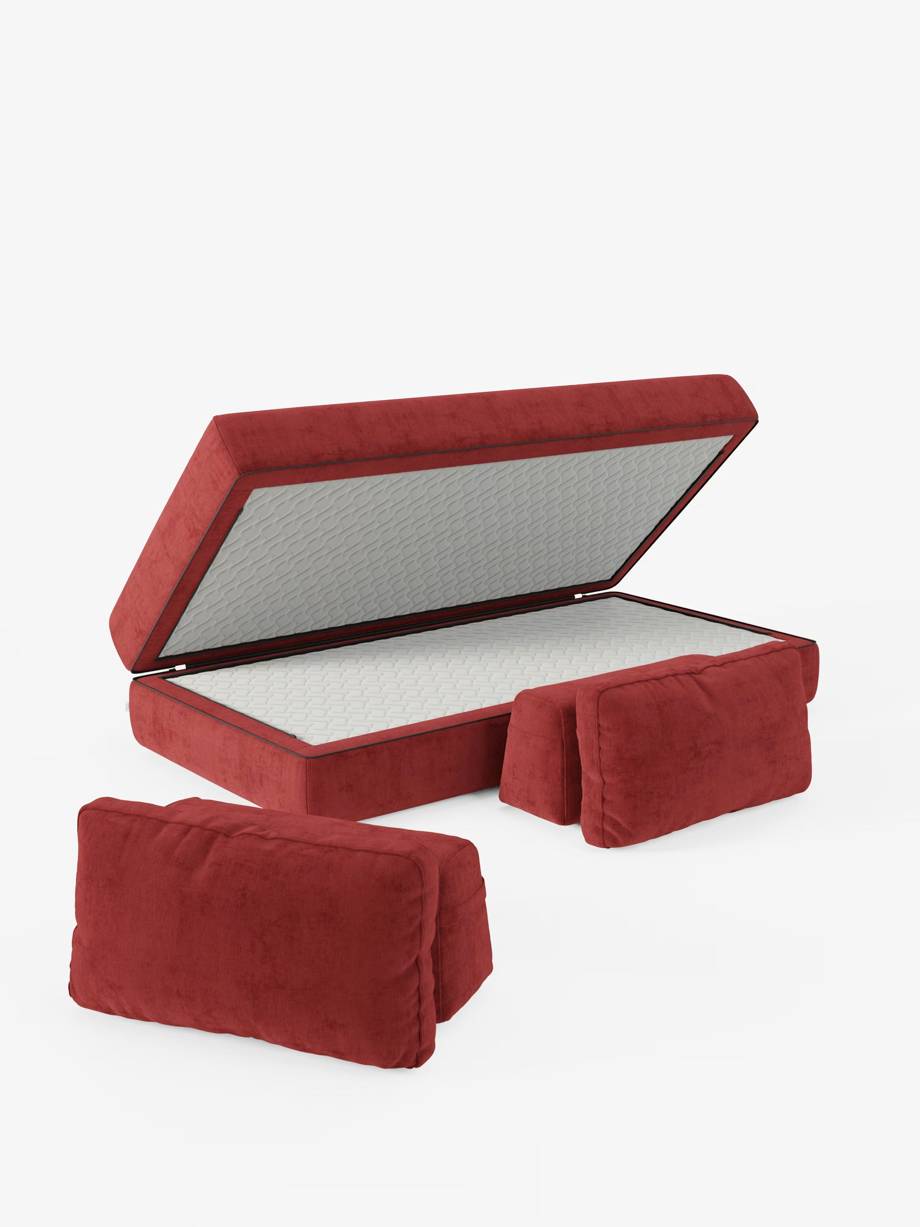 Ecco il divano letto matrimoniale Rift a 2 e 3 posti di Divani.Store: questo elegante letto contenitore rosso è rivestito in tessuto T31 facile da pulire e include un materasso in memory foam alto 24 cm. Sollevando il materasso si scopre un ampio vano contenitore interno, mentre due schienali mobili abbinati di colore rosso sono posizionati nella parte anteriore per sottolinearne il fascino versatile e di design all’avanguardia. Il tutto su uno sfondo bianco a tinta unita.