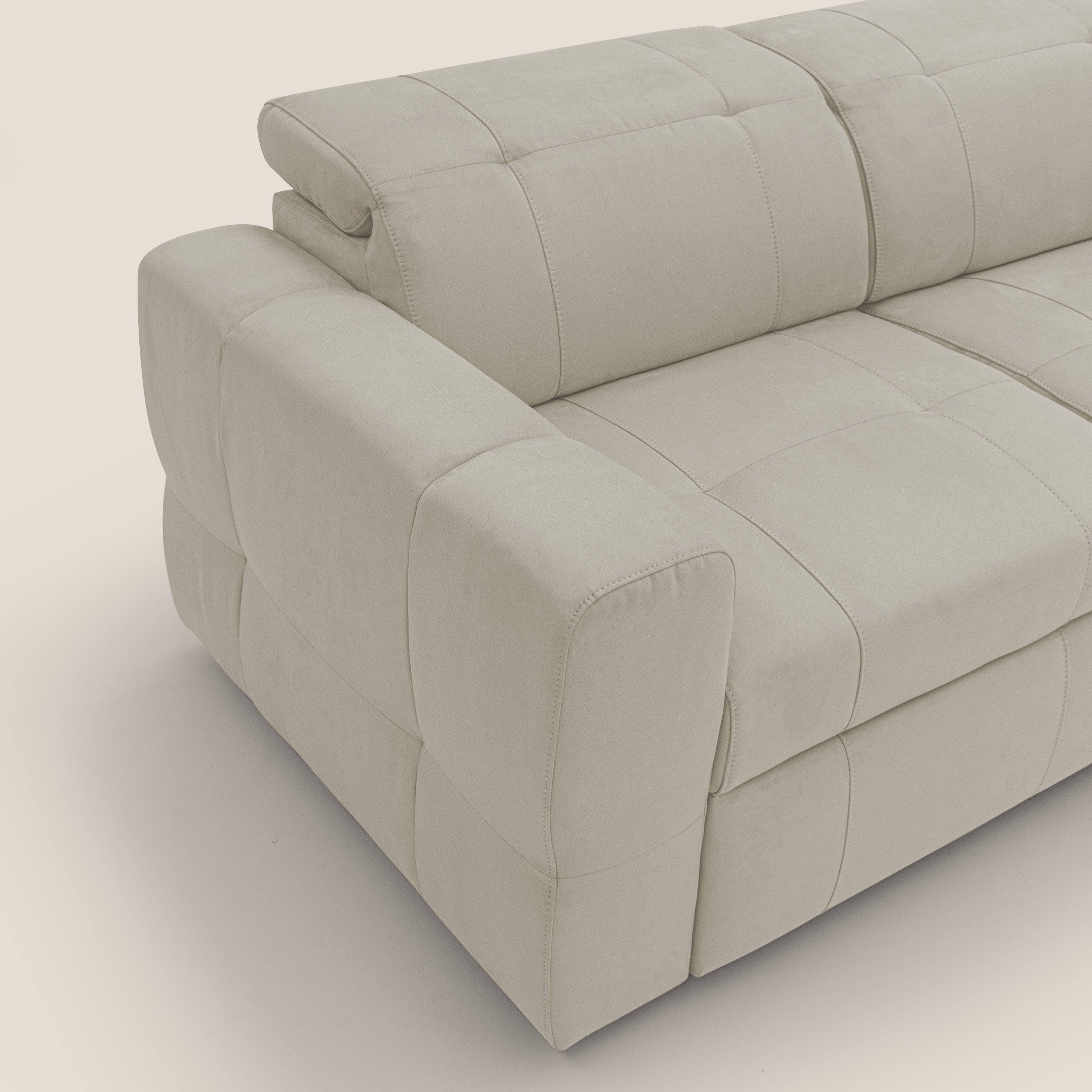 Kronos Divano angolare con poggiapiedi estraibile e pouf contenitore mobile in microfibra impermeabile T11 panna - divani.store