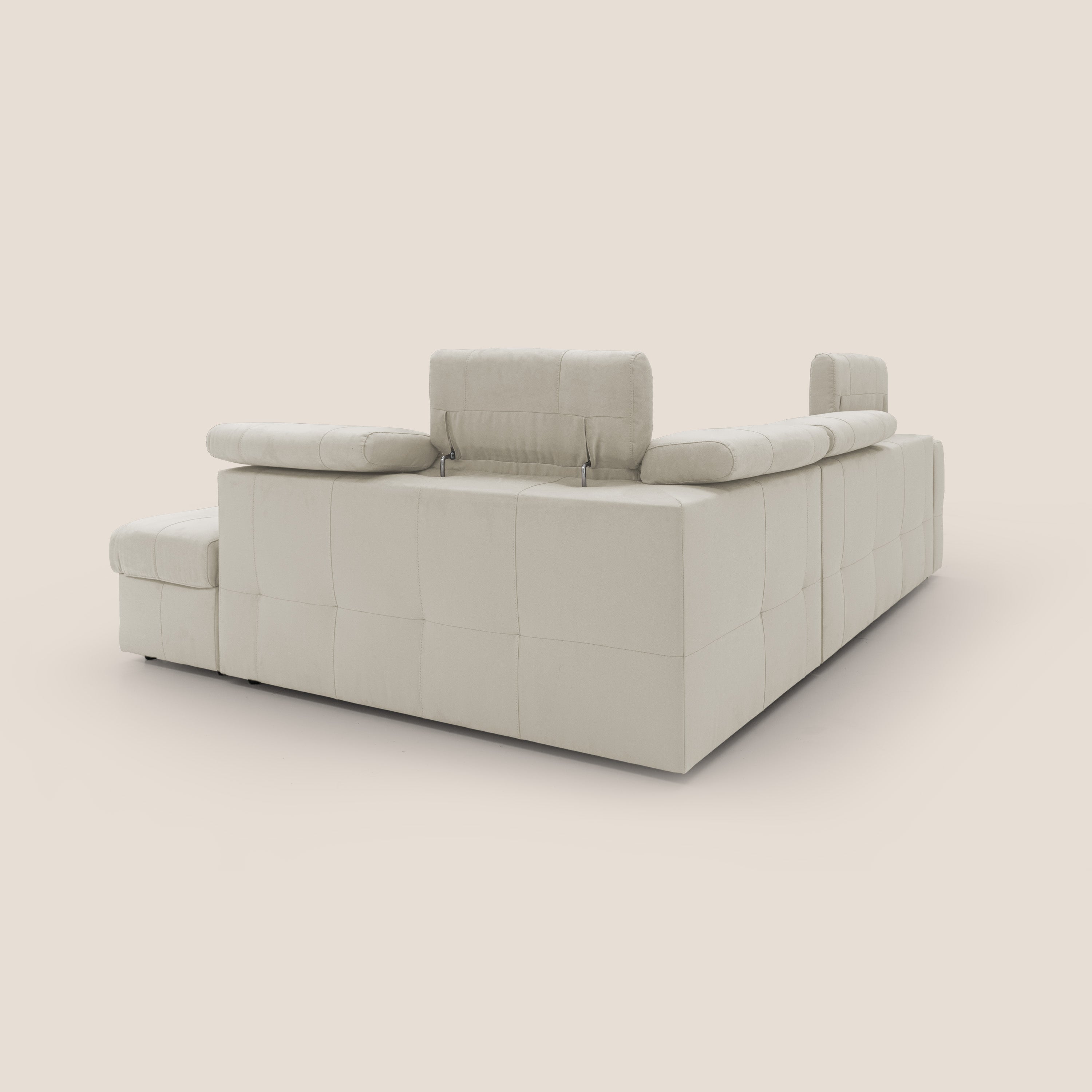 Kronos Divano angolare con poggiapiedi estraibile e pouf contenitore mobile in microfibra impermeabile T11 panna - divani.store
